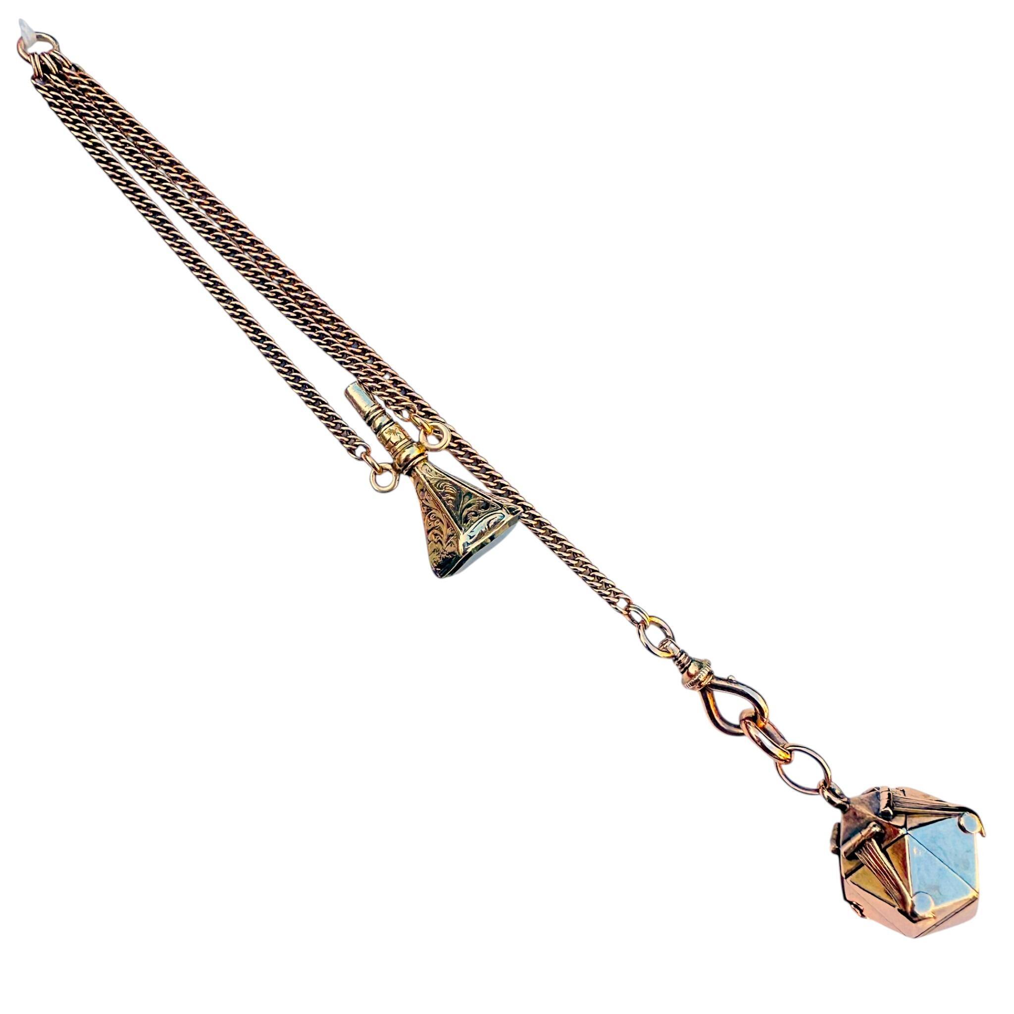 side profile of Rare Antique Rose Gold, Opening Hexagonal Cross Masonic Pendant & Bloodstone Watch Key Fob with white background