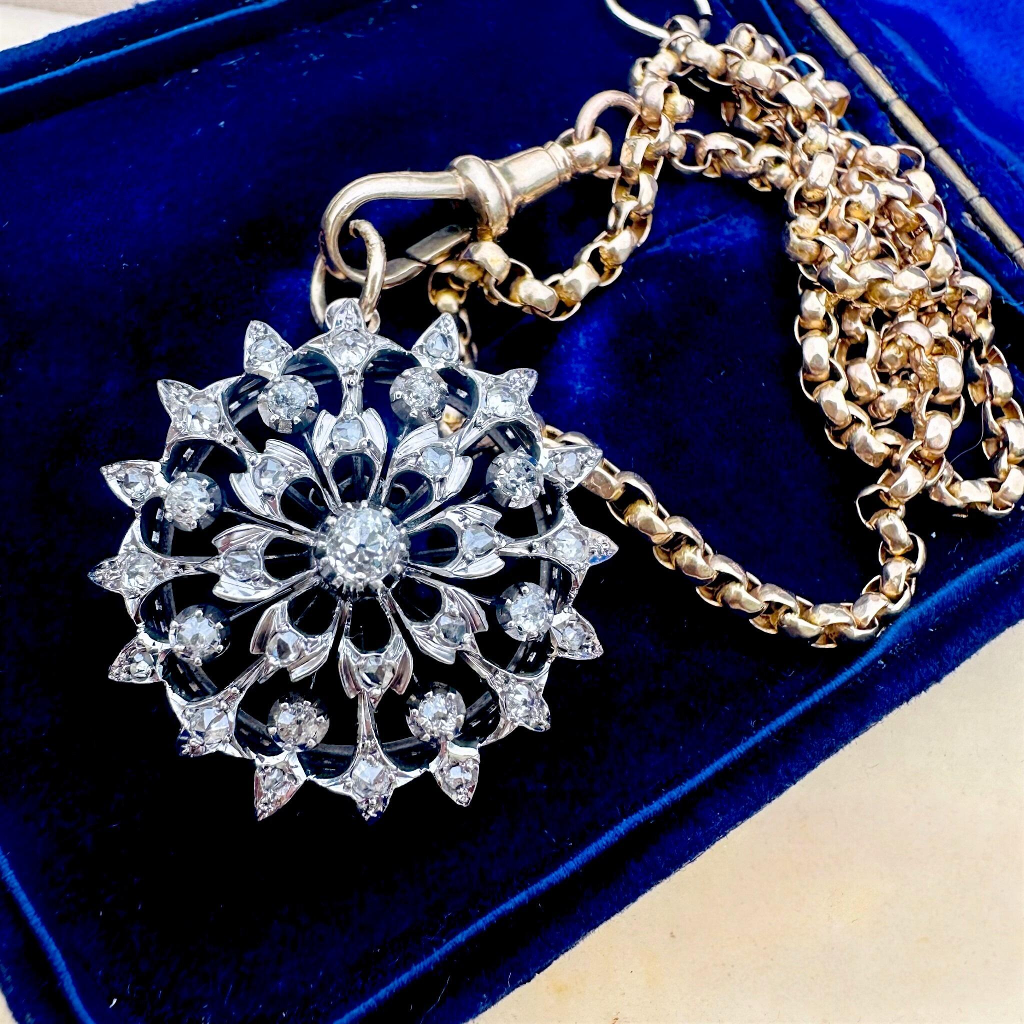Antique Victorian Diamond Flower Pendant Brooch, displayed on blue velvet box