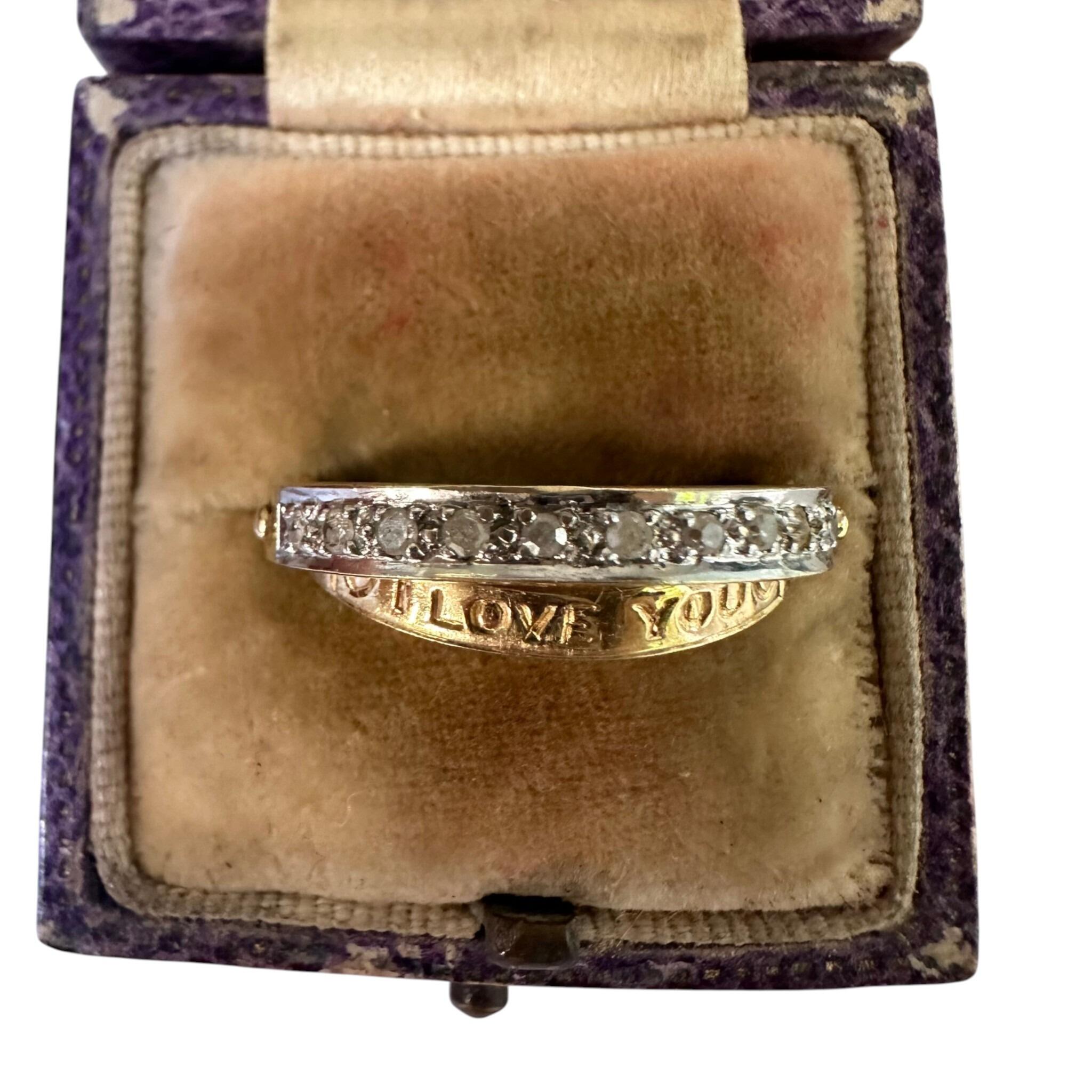 top view of Vintage Gold & Diamond Secret Message "I Love You" Ring displayed in antique box
