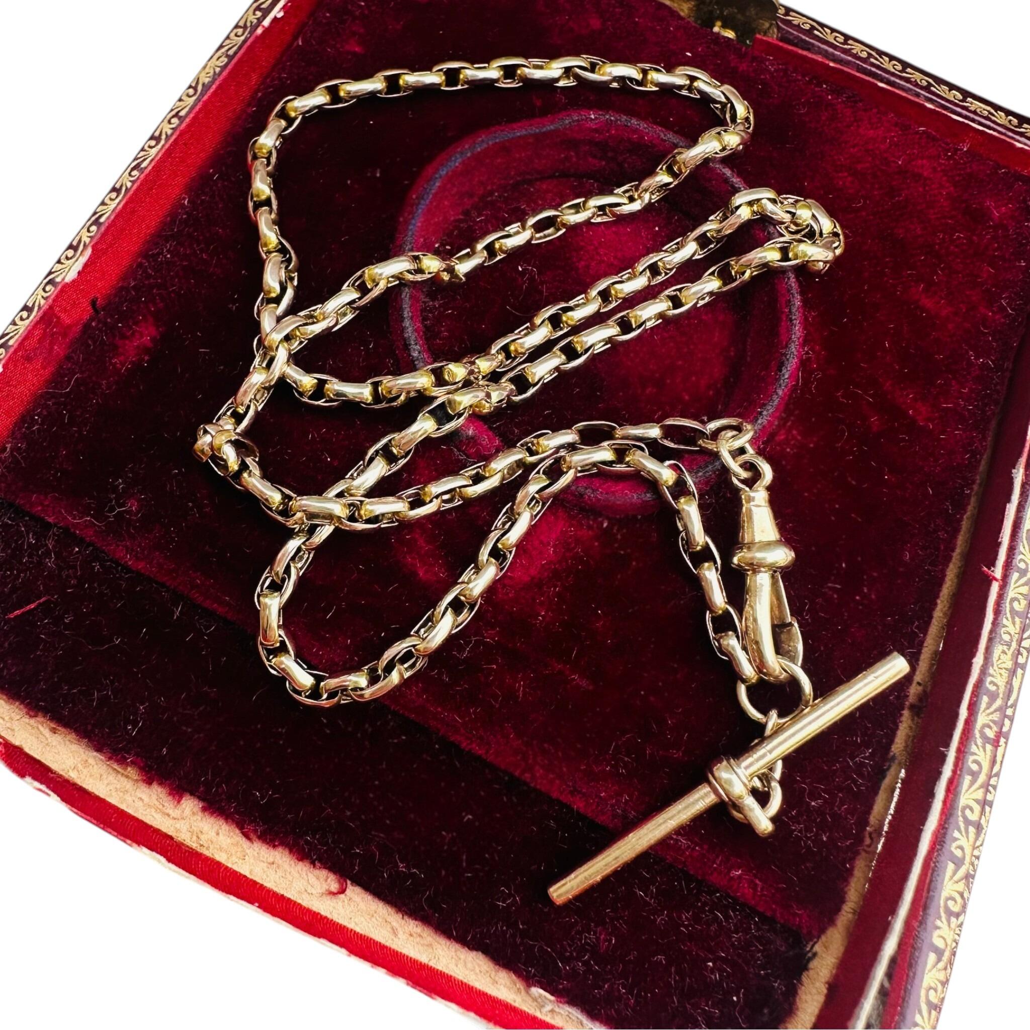 Antique Victorian Gold Bike Link Chain, Dog Clip & T-bar Clasp displayed on antique box