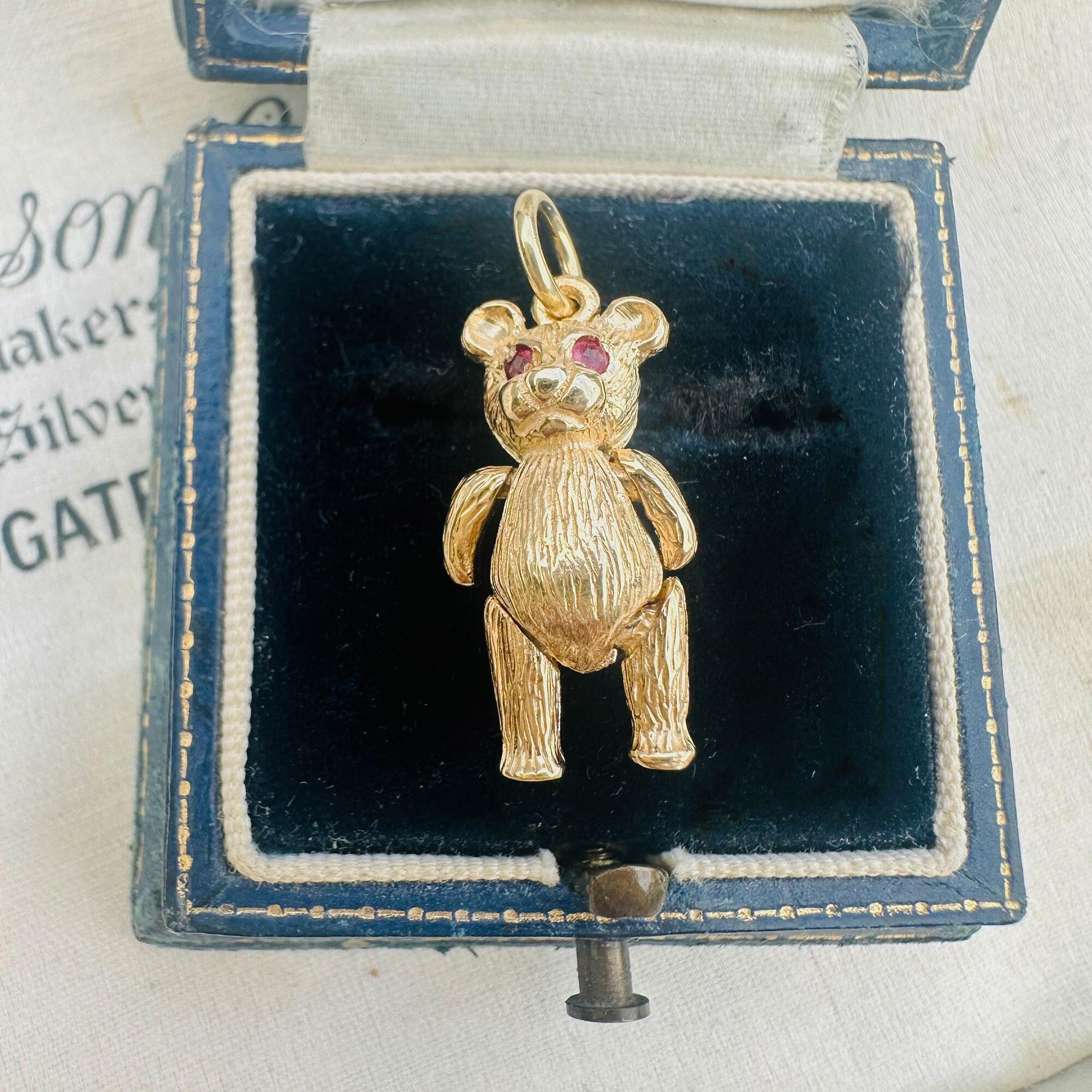 Vintage 9ct Gold Teddy Bear Pendant: Ruby Eyes, Articulated London Charm displayed in antique box