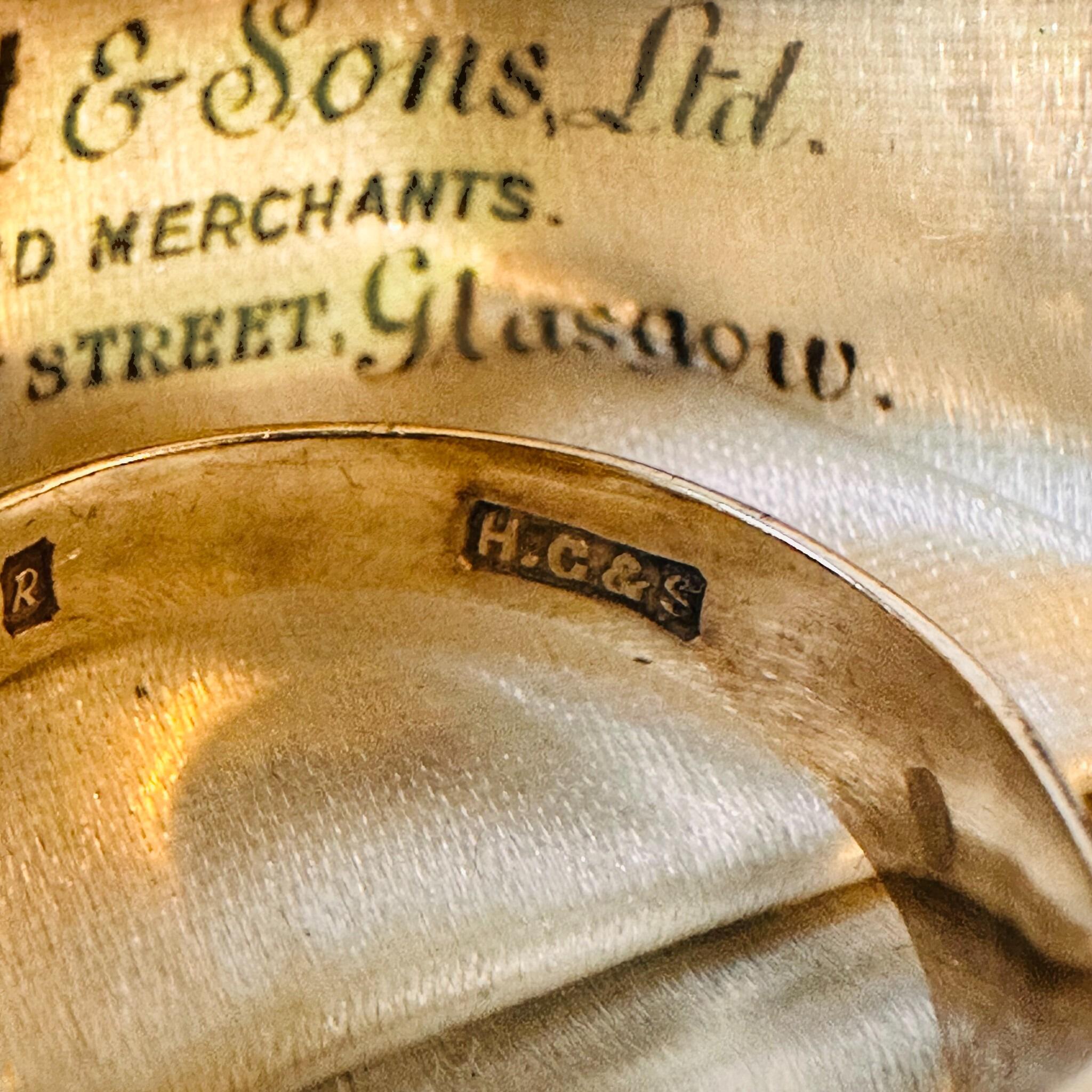 close up of Vintage, 9ct, 9k, 375 Gold Black Onyx signet ring, dated 1965, dated 1965, displayed in antique box.