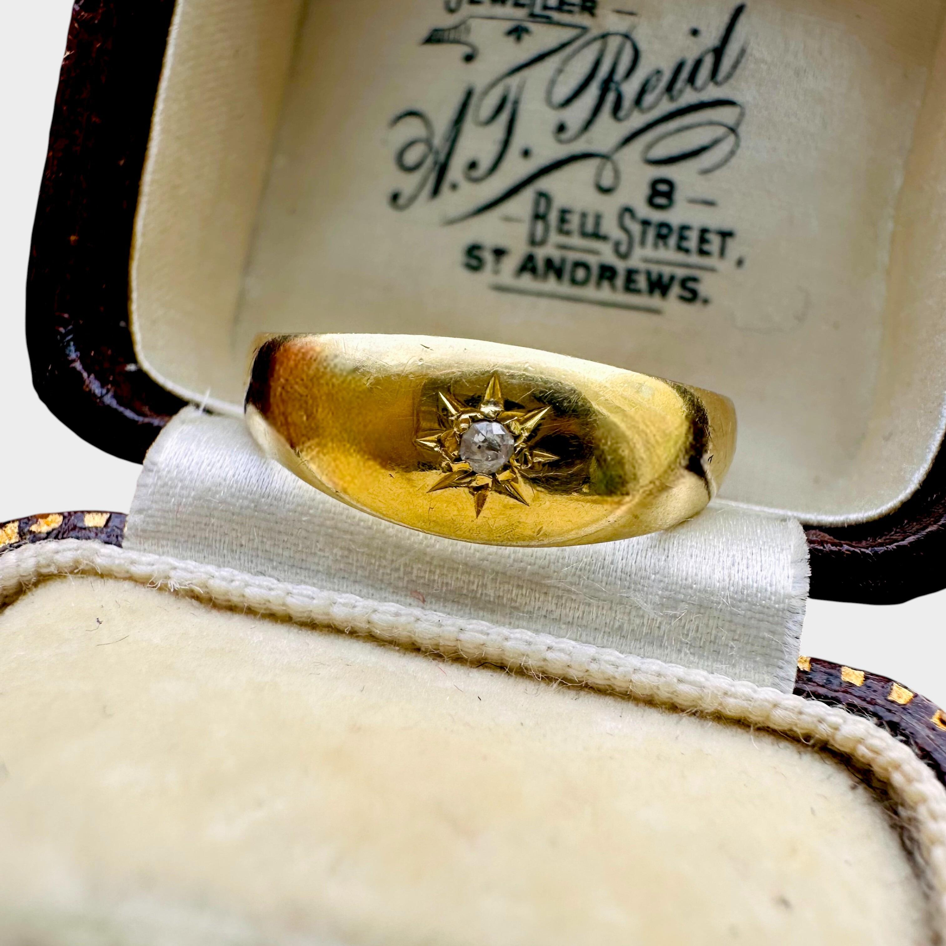 18ct Gold & Diamond Star Set Gypsy Ring, displayed on antique box grey background