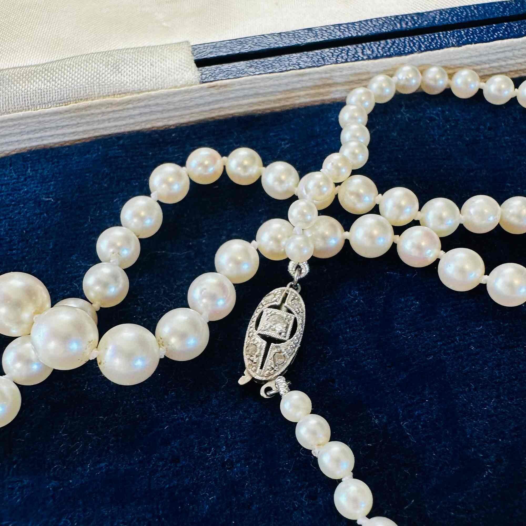 14ct White Gold & Diamond Saltwater Cultured Pearl Necklace, displayed on antique box