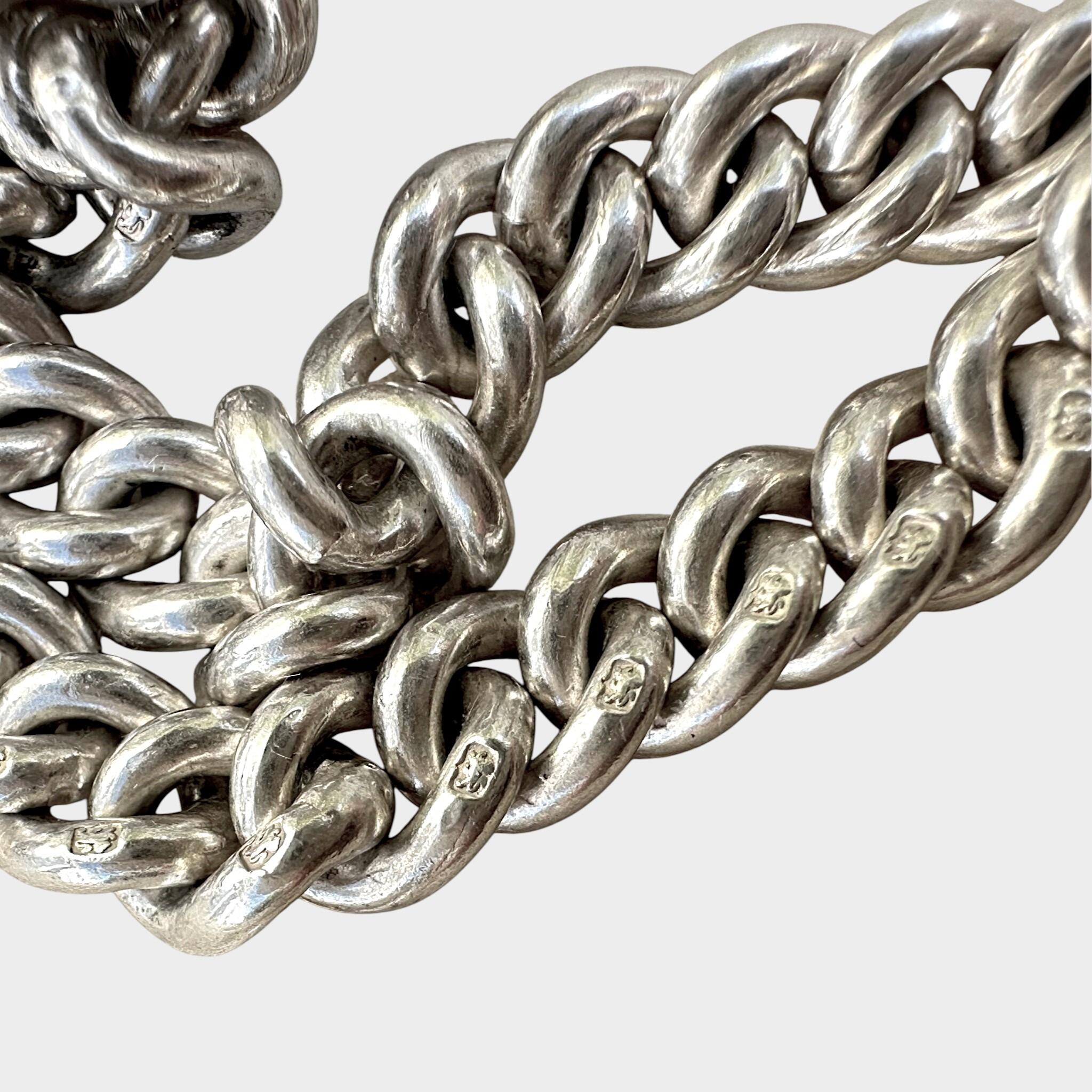 close up of Antique Chunky Silver Albert Chain Necklace, T-Bar & Dog Clip with grey background