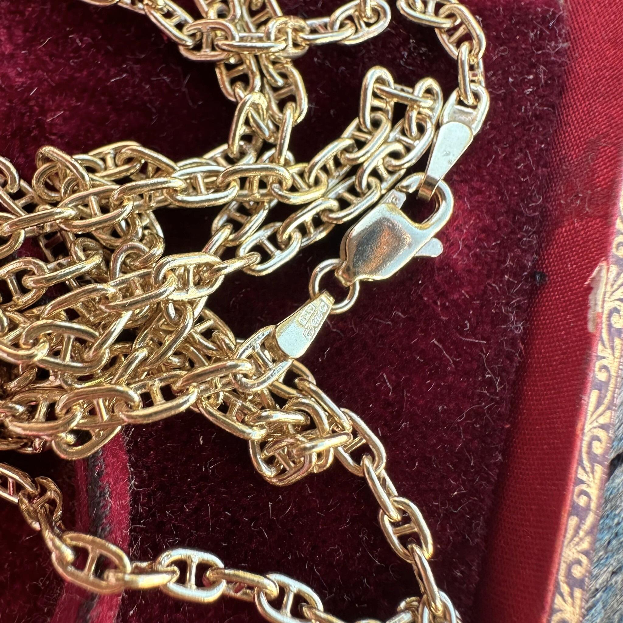 Gold Mariner Anchor Link Chain Necklace displayed laying in red velvet antique box