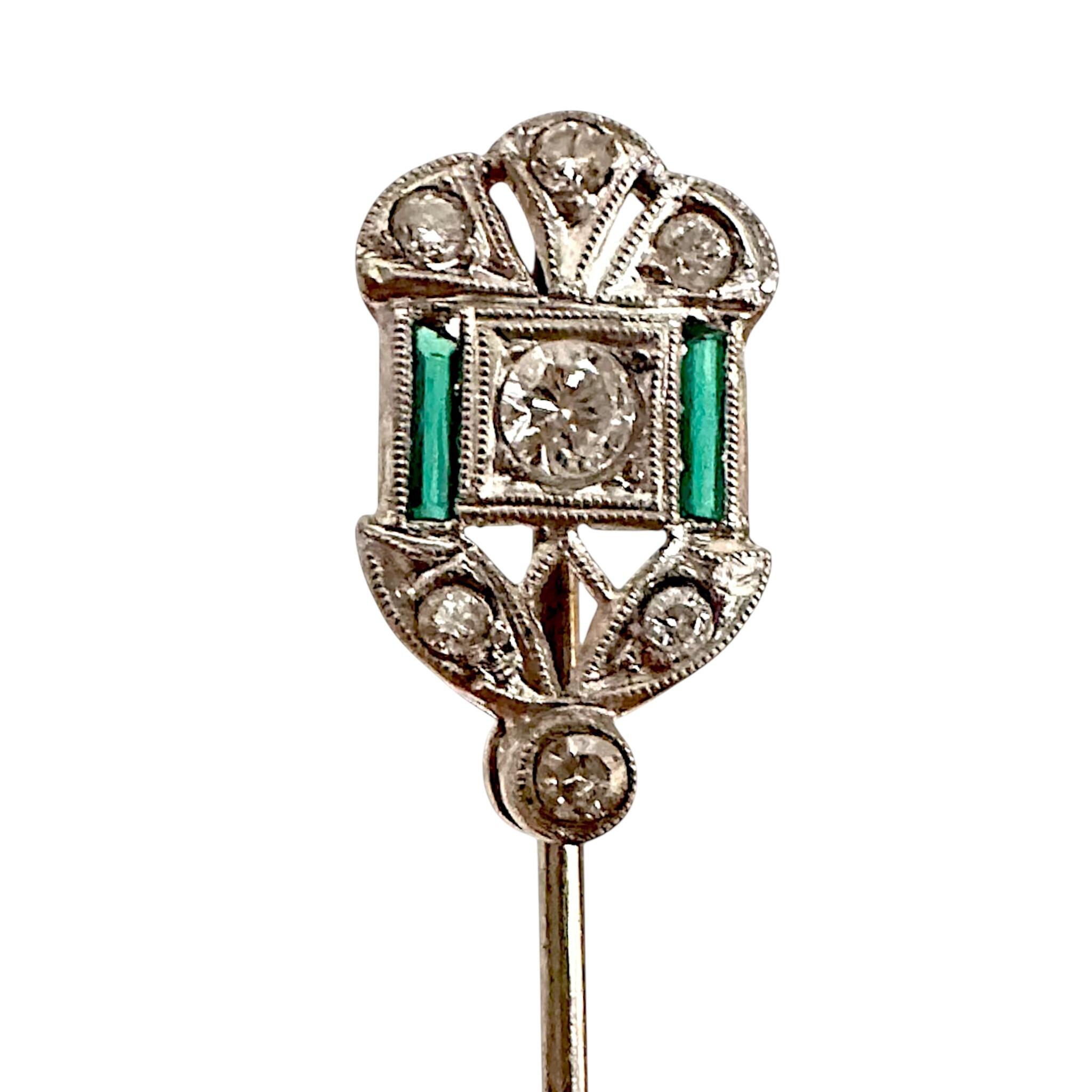 Platinum Art Deco Emerald Diamond Stick Pin, white background.