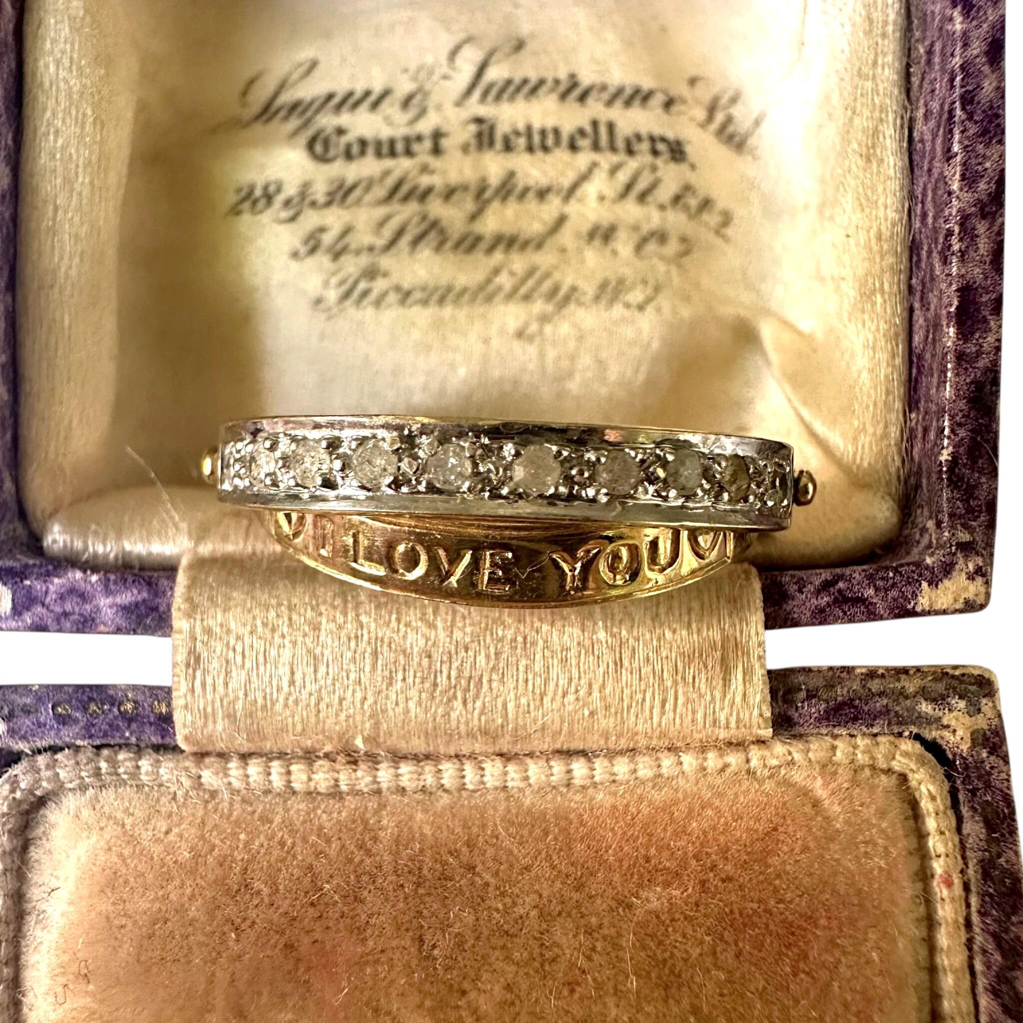 front view of Vintage Gold & Diamond Secret Message "I Love You" Ring displayed in antique box