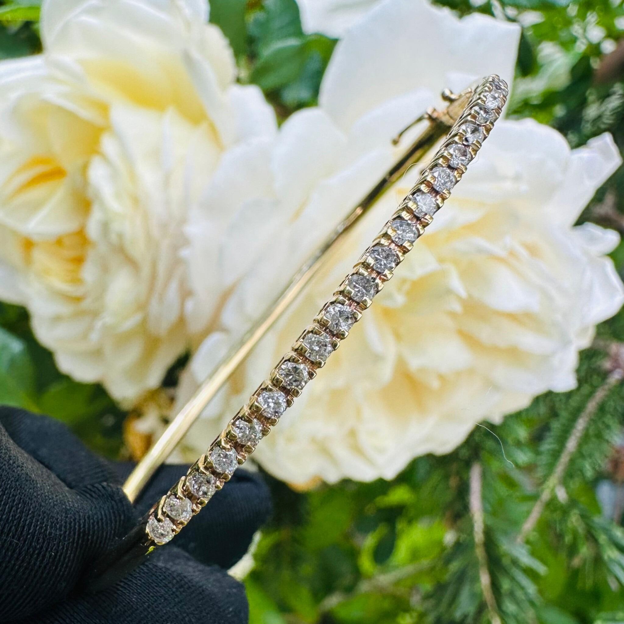 Vintage Gold & Diamond Tennis Style Bangle with garden background