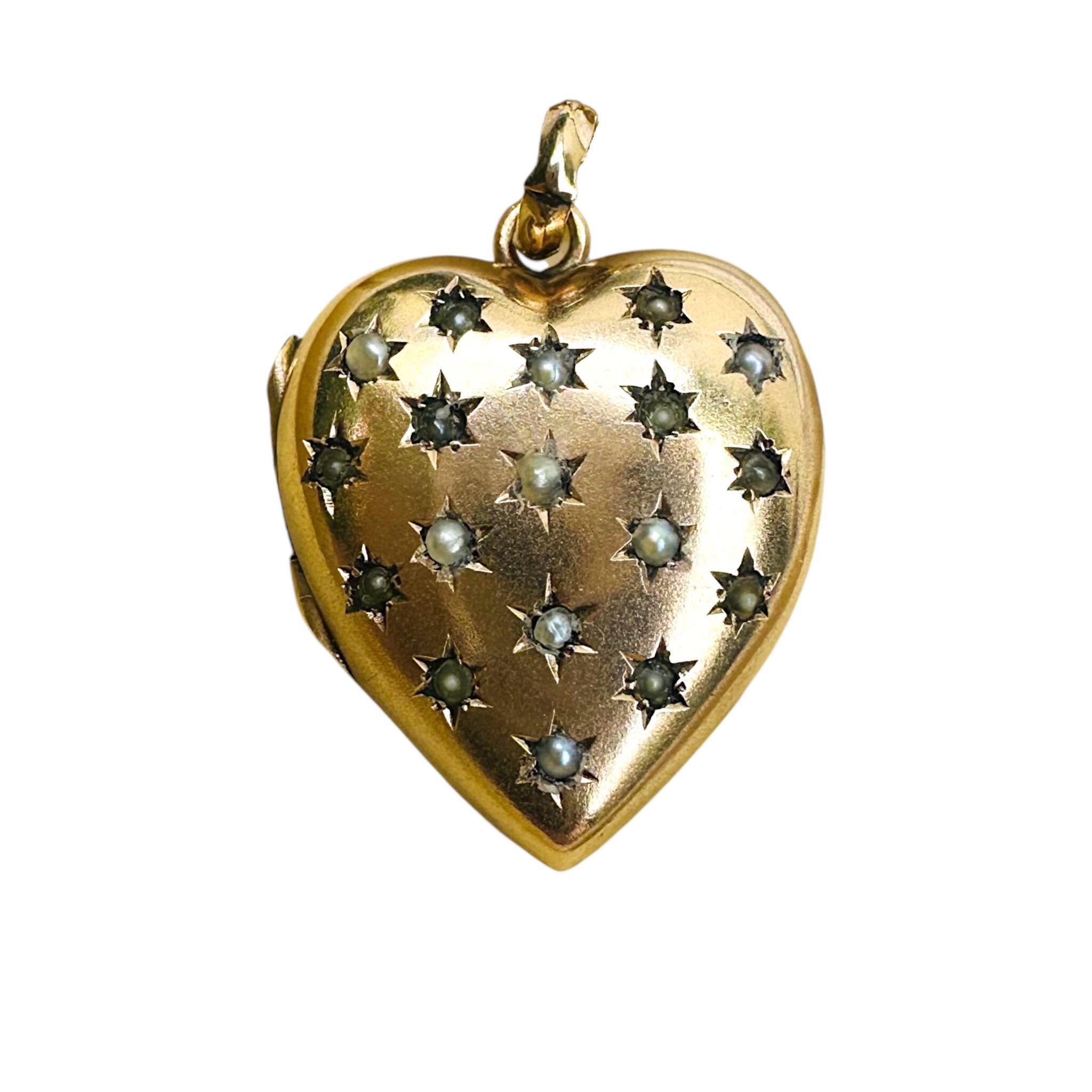 front view of Vintage Gold Pearl Star Set Puffy Heart Locket with white background