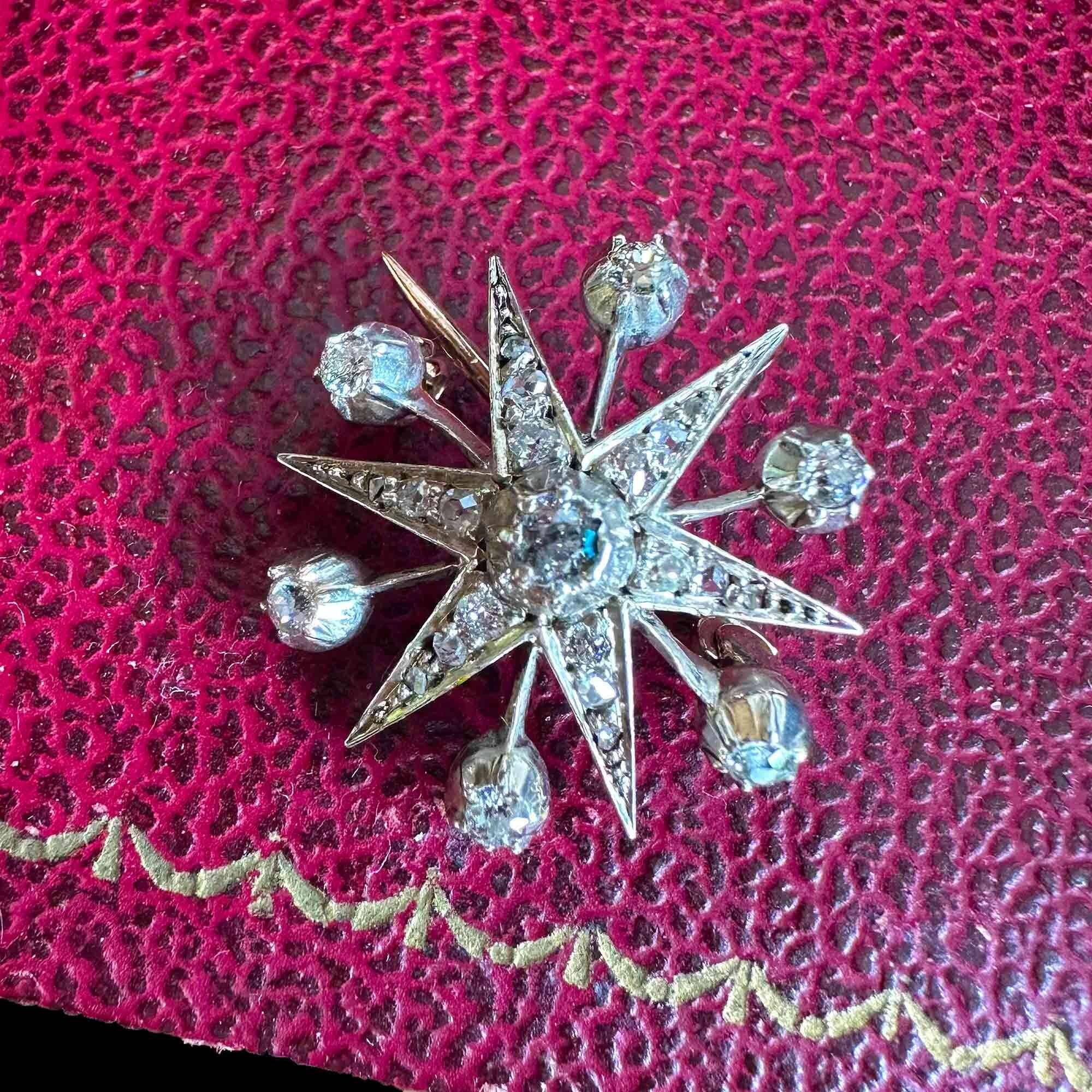 Victorian diamond star pendant / brooch on red leather antique box.