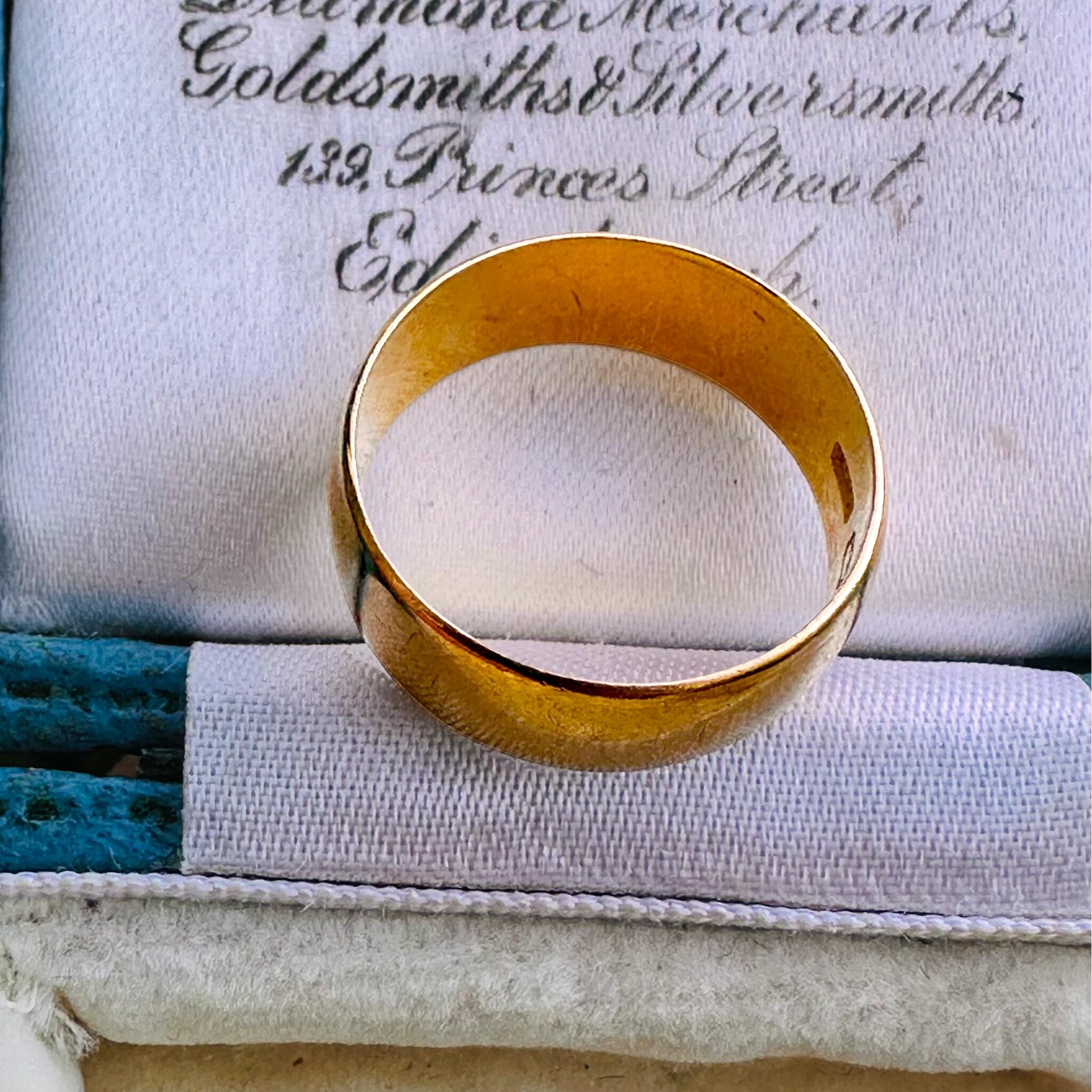 top view, Vintage Solid 22ct Gold Wedding Ring, displayed in antique box