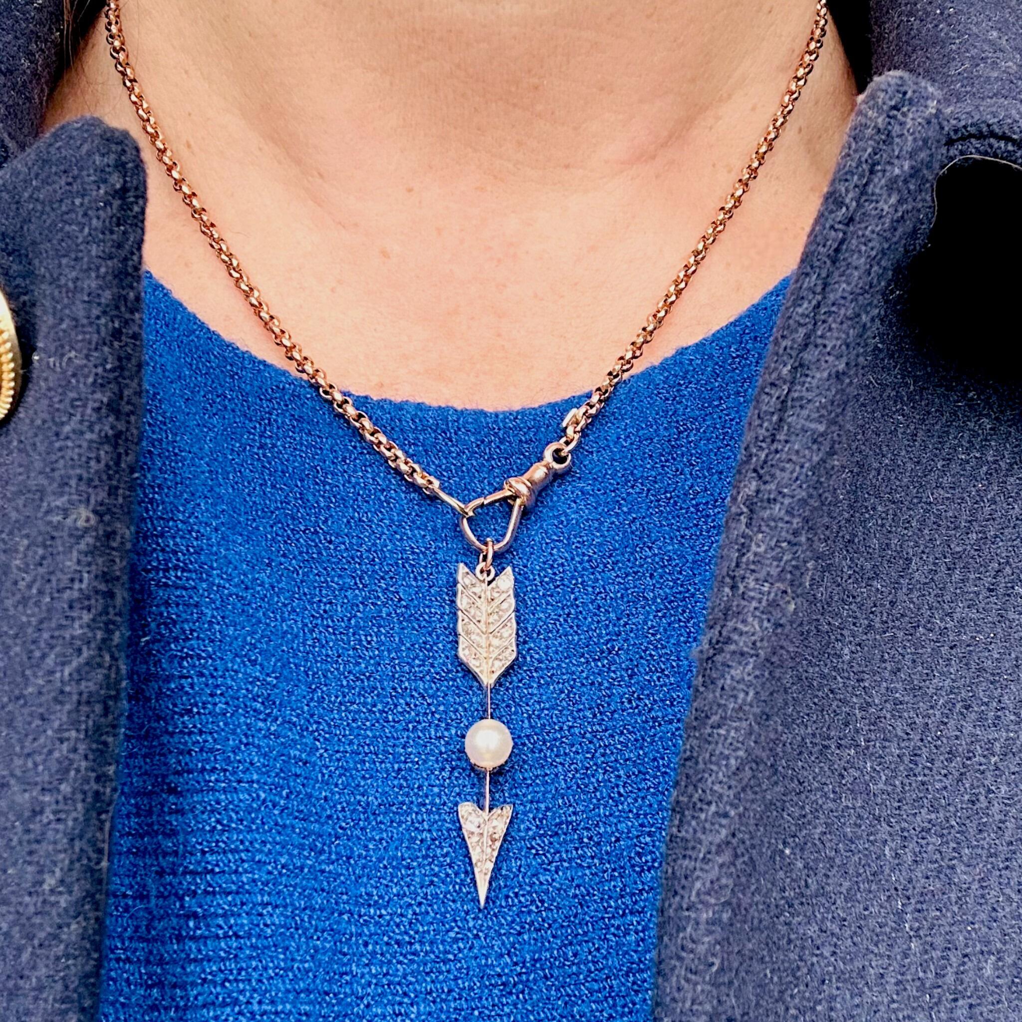 Victorian Rose Cut Diamond & Pearl Cupid’s Arrow Pendant worn around models neck