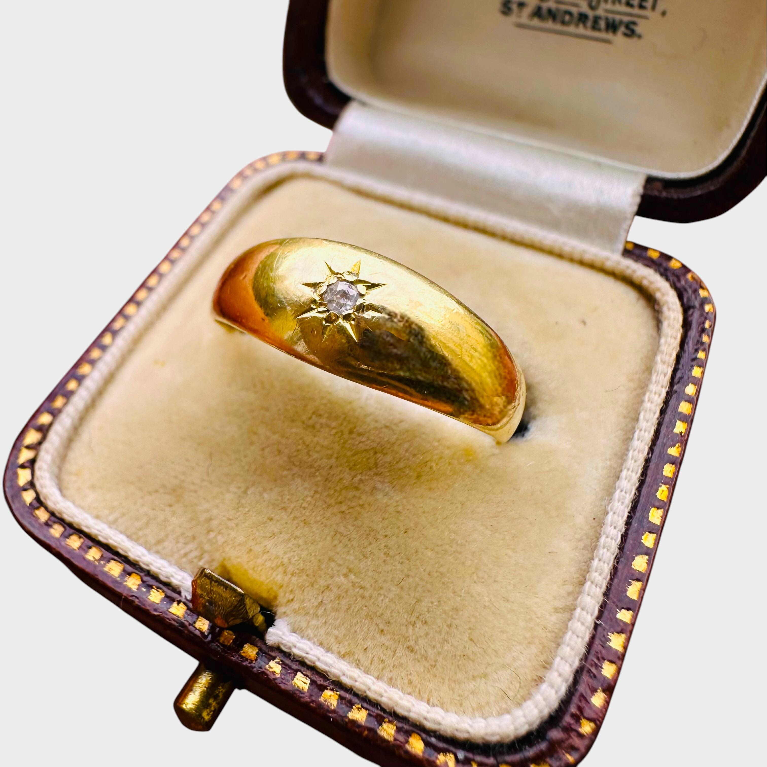 18ct Gold & Diamond Star Set Gypsy Ring, displayed in antique box grey background.