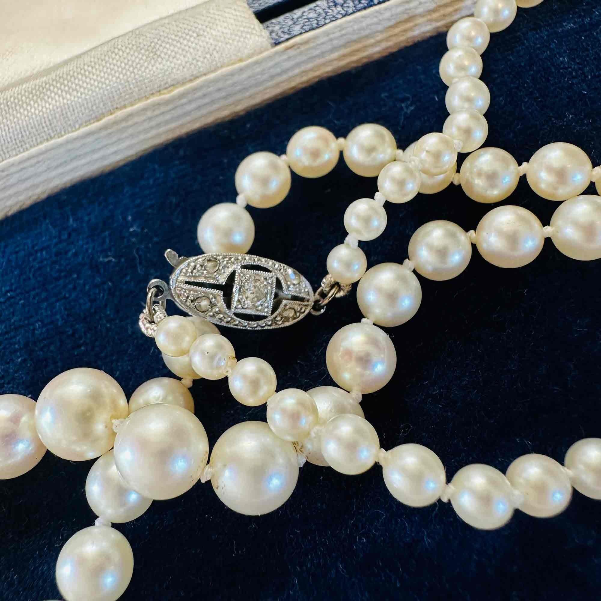 14ct White Gold & Diamond Saltwater Cultured Pearl Necklace, displayed on antique box