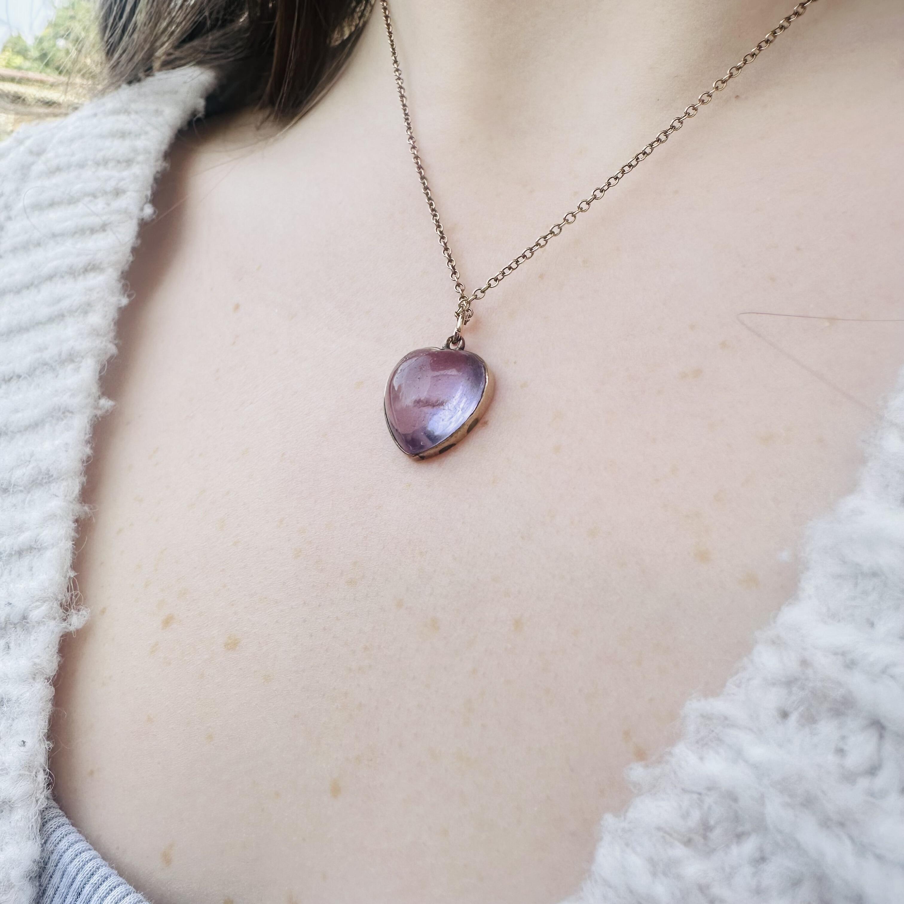 side profile of Rose de France Amethyst Heart Pendant & Gold rolo link chain worn on models neck