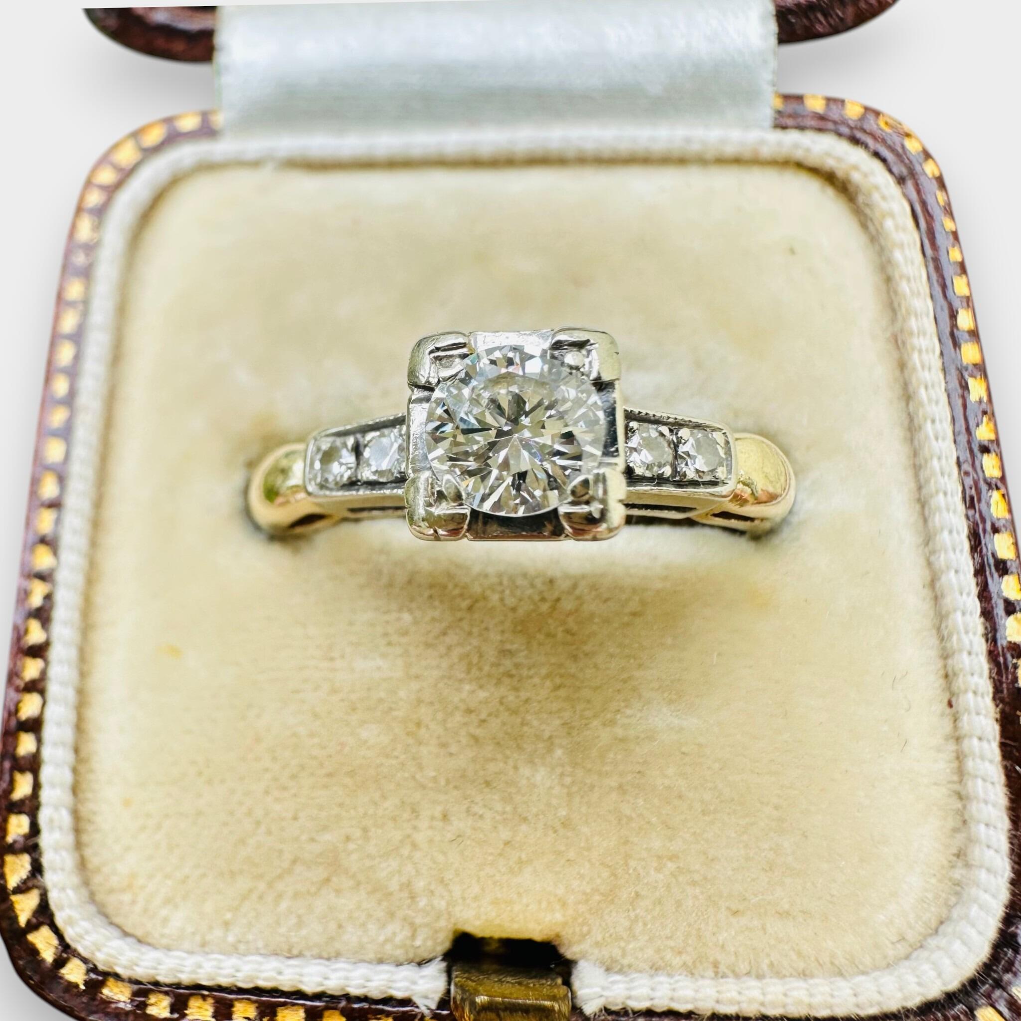 top view of18ct Gold & Platinum Diamond Solitaire 0.55ct Ring displayed in antique box