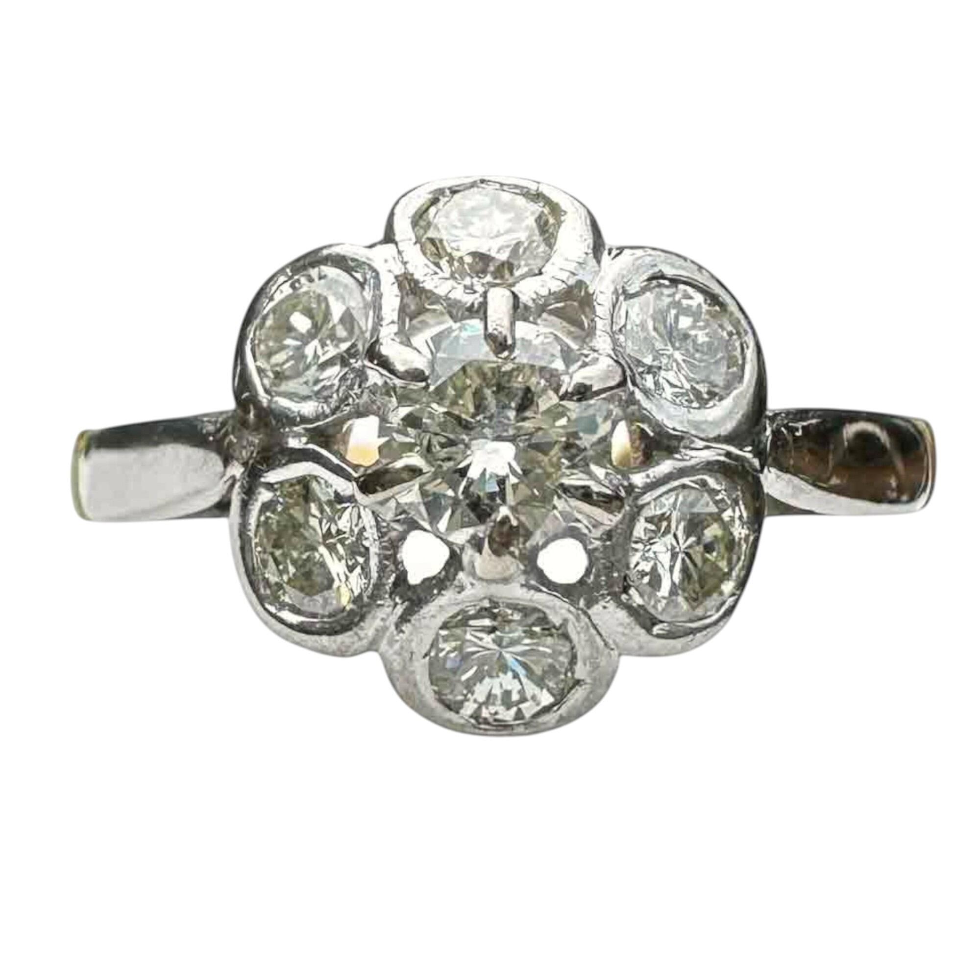 daisy ring with diamonds set in white gold on yellow gold shank