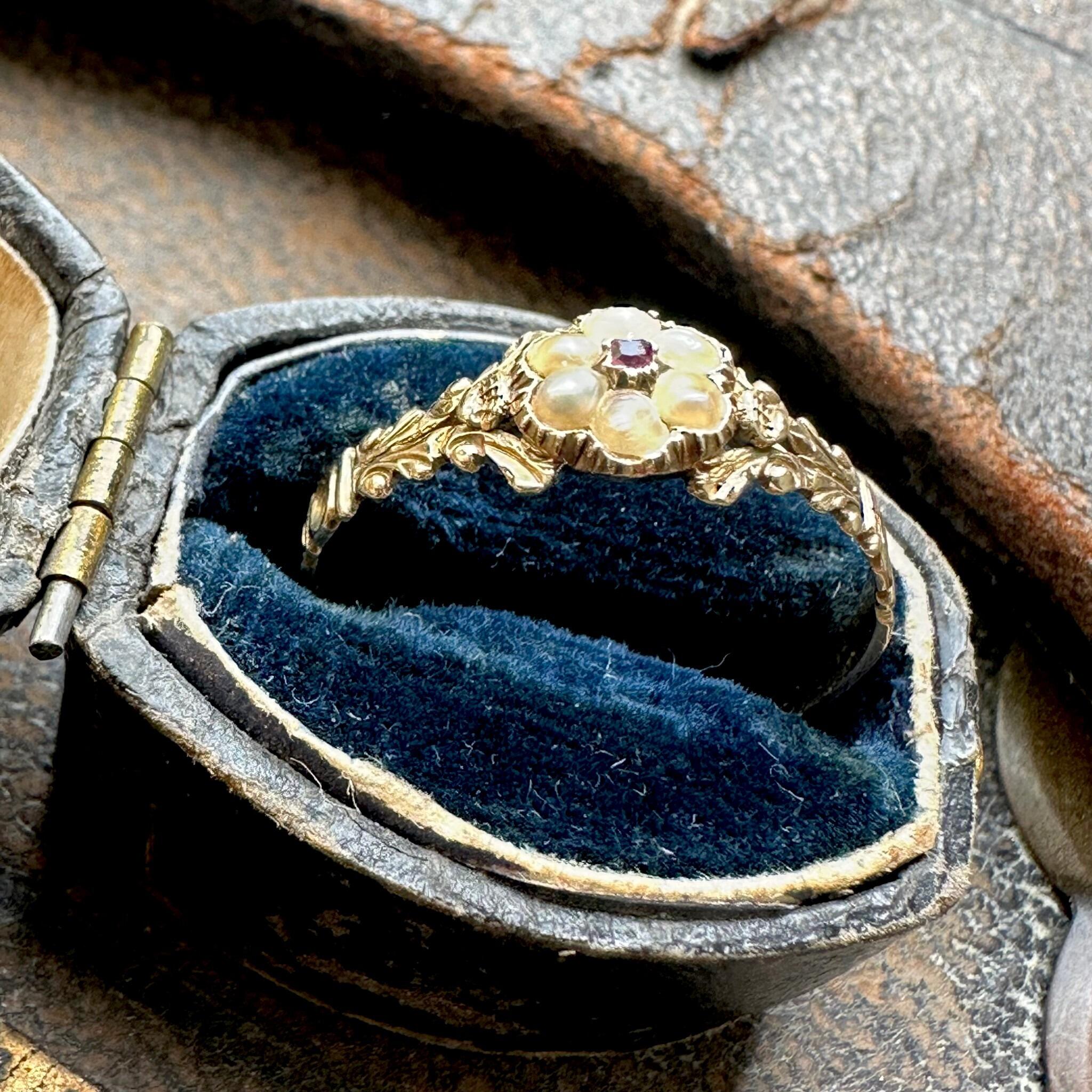 Antique Georgian Regency Pearl & Ruby Daisy Ring displayed in antique box