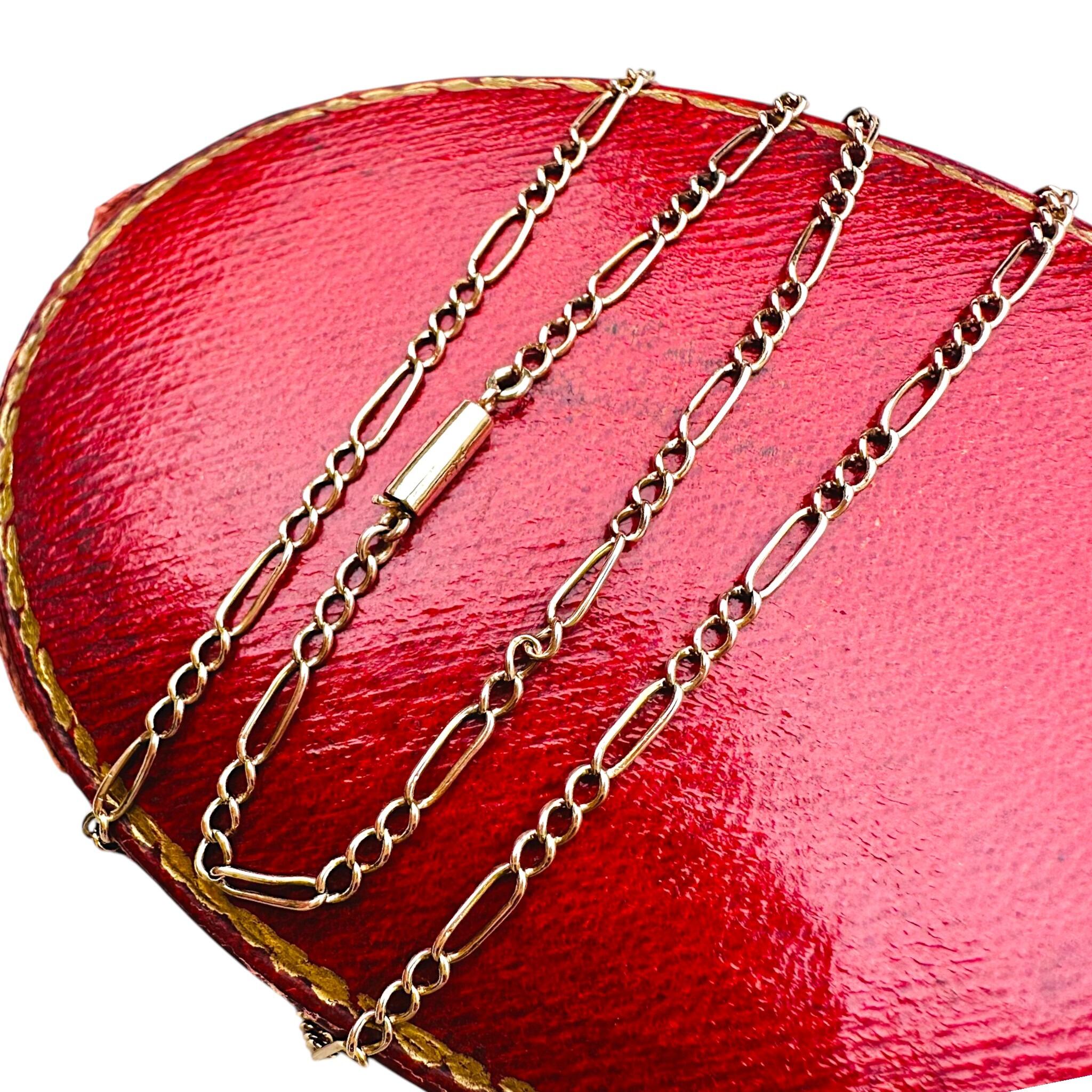 Antique Edwardian Rose Gold Fetter Link & Barrel Clasp Chain Necklace displayed on red antique box with white background
