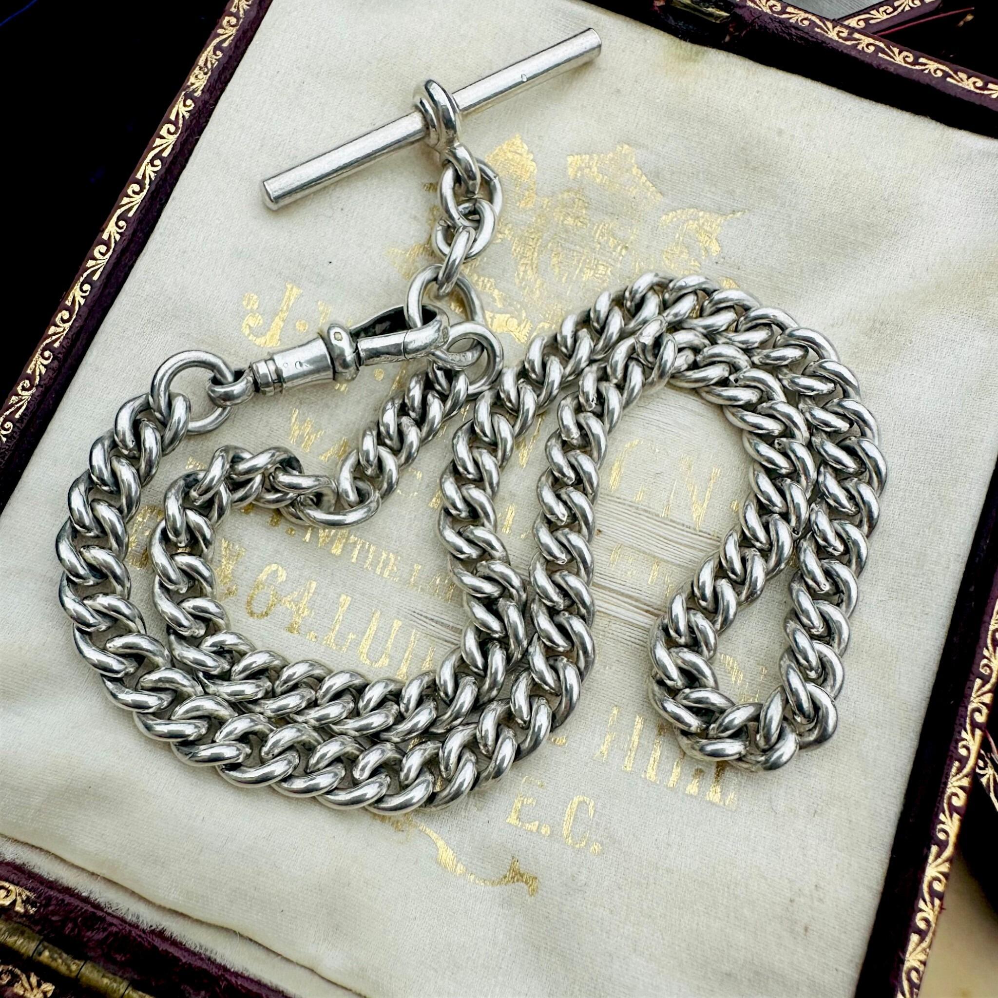 Antique Edwardian Sterling Silver Albert Chain, T Bar & Dog Clip displayed on antique box