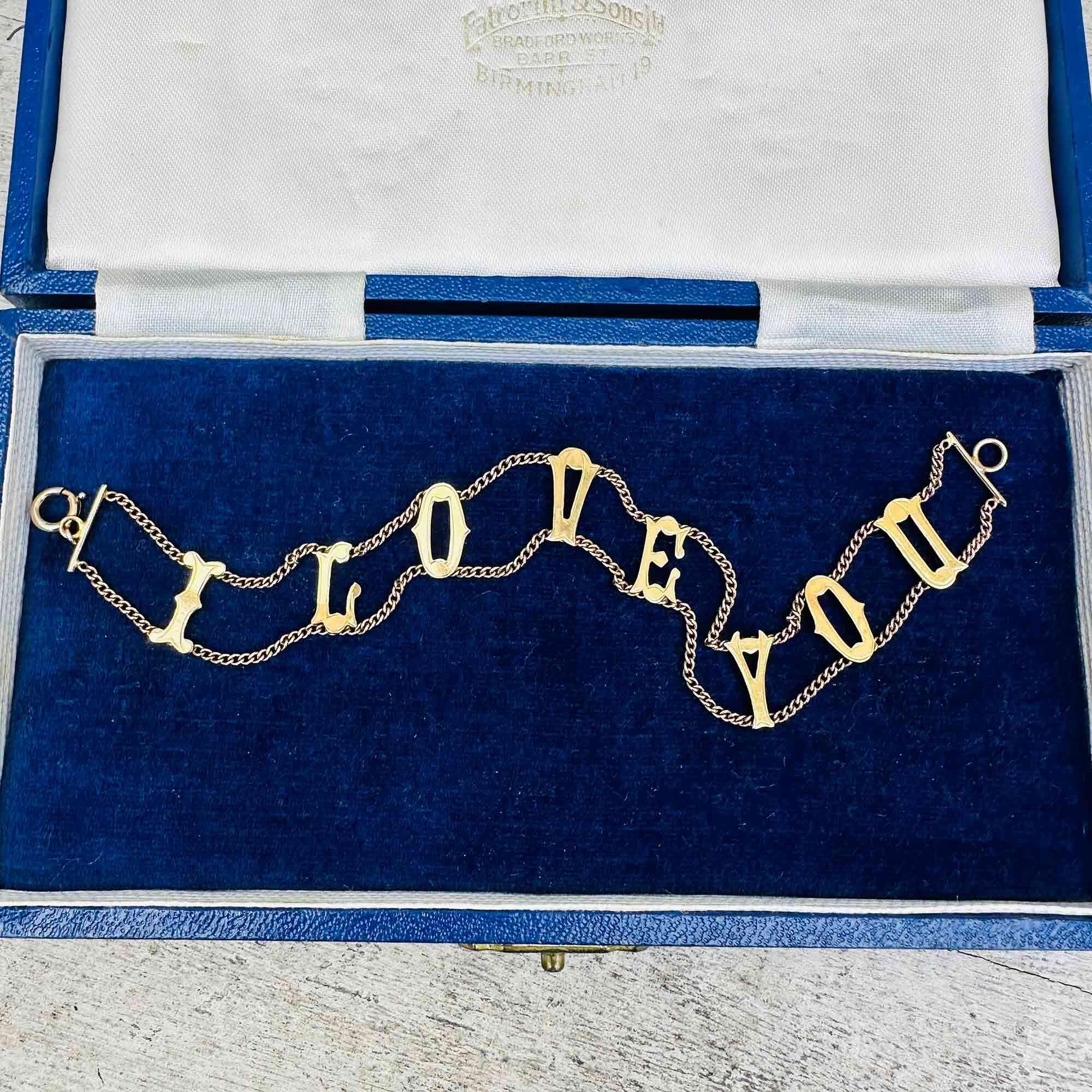 Vintage 9ct gold bracelet with "I Love You" links, front view