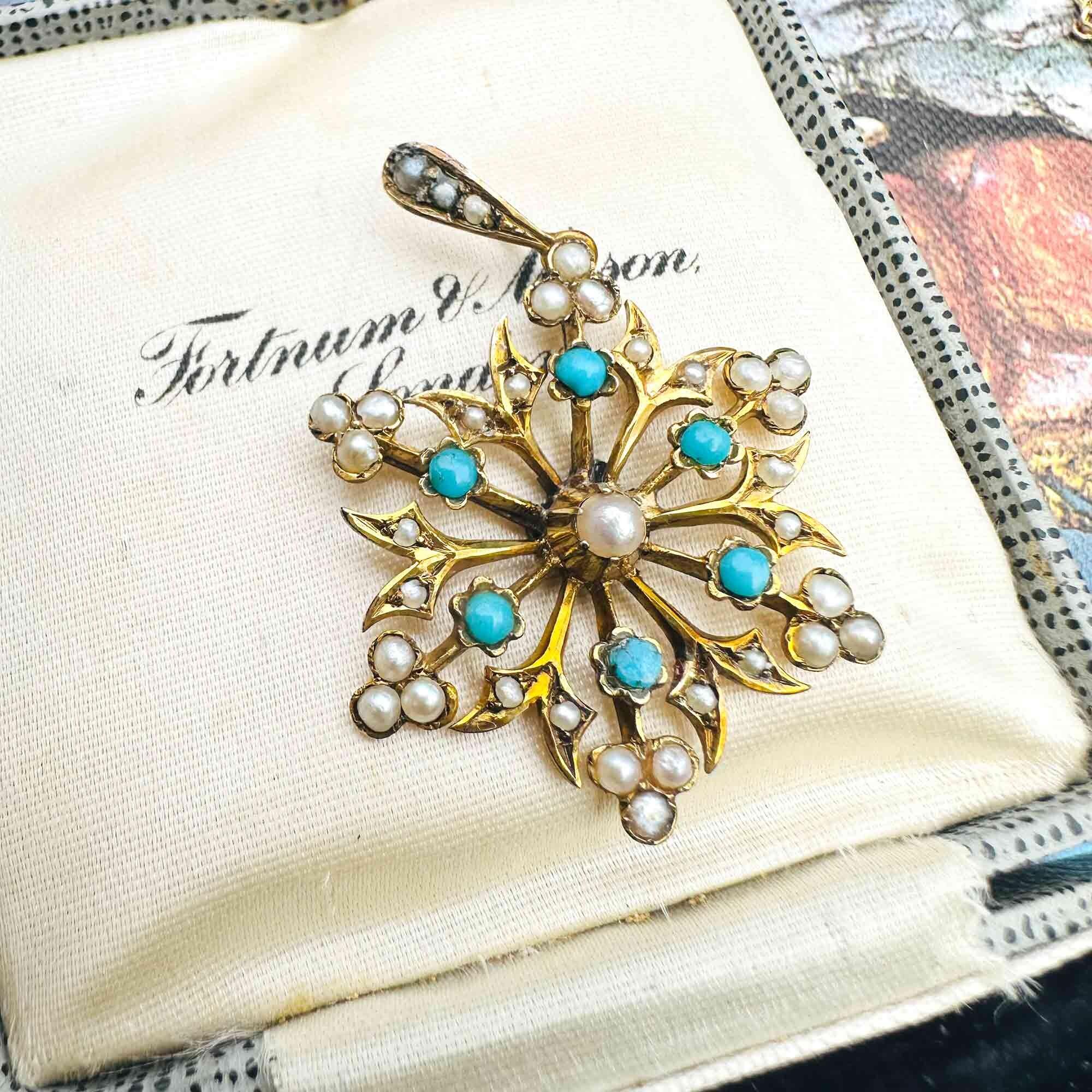 antique 9ct gold Turquoise and pearl snowflake pendant on antique box.