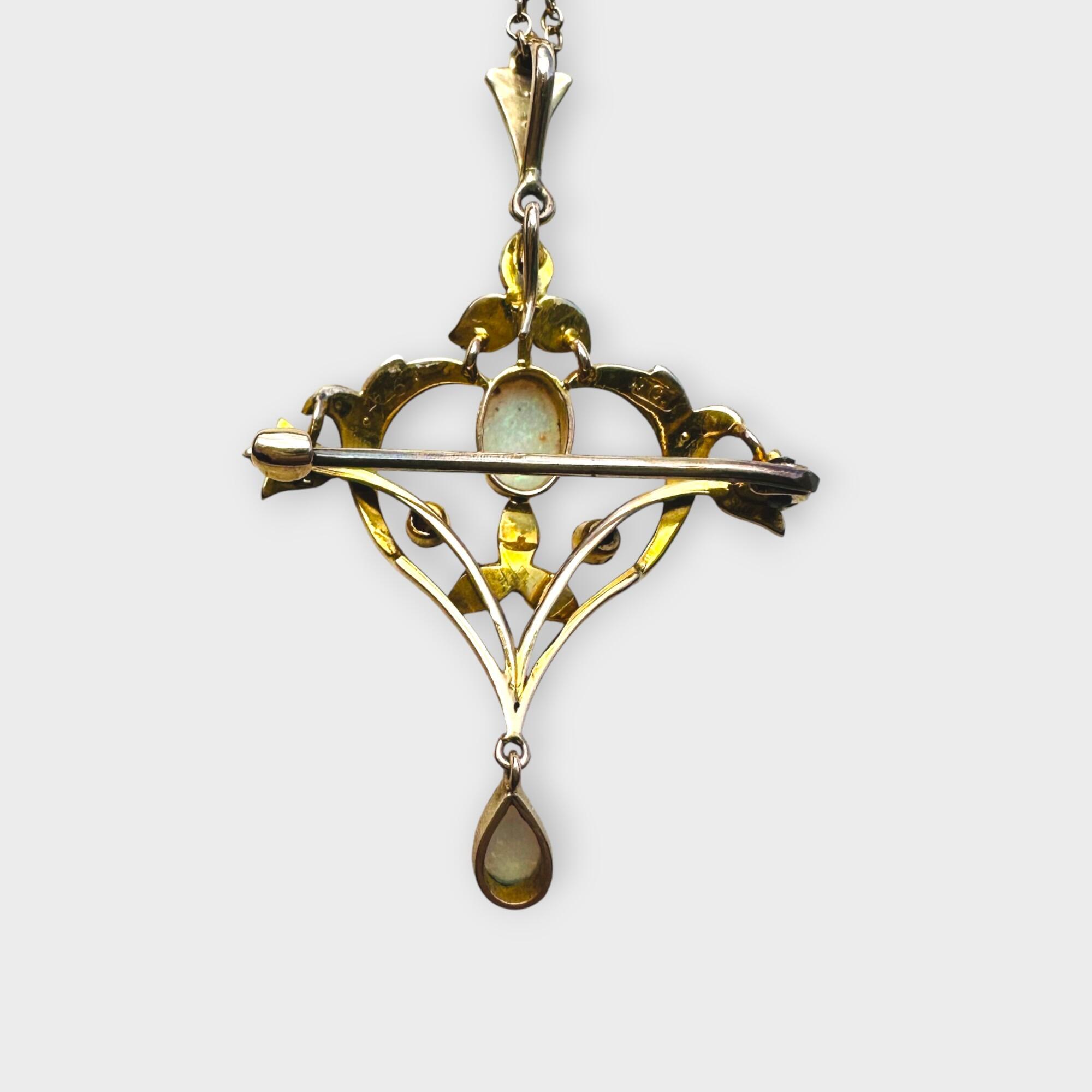 Back of Art Nouveau pendant brooch showing gold brooch fitting and detachable bail – p343