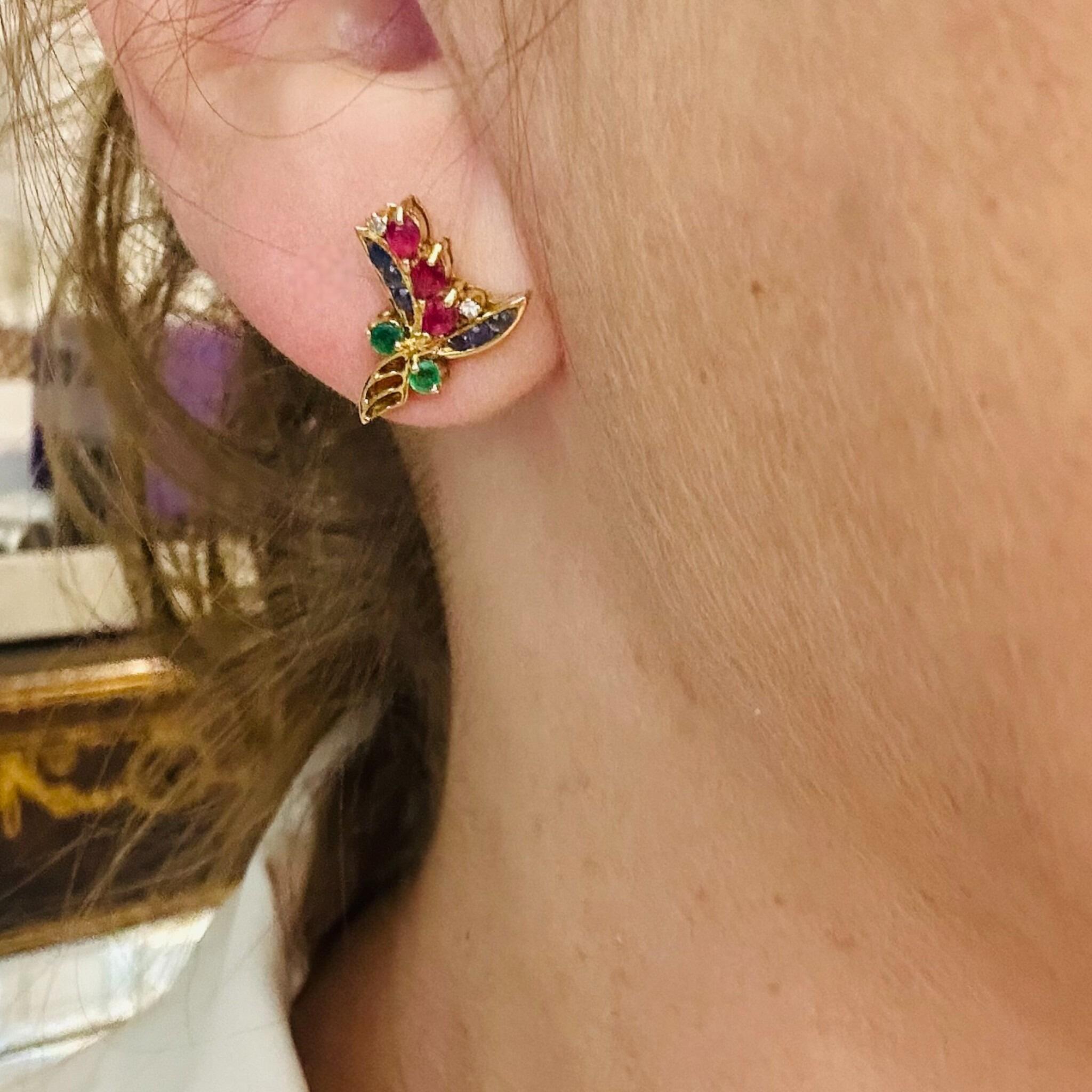 18K Yellow Gold Floral Sprig Earrings with Sapphires, Rubies, Emeralds & Diamonds displayed in models ear.