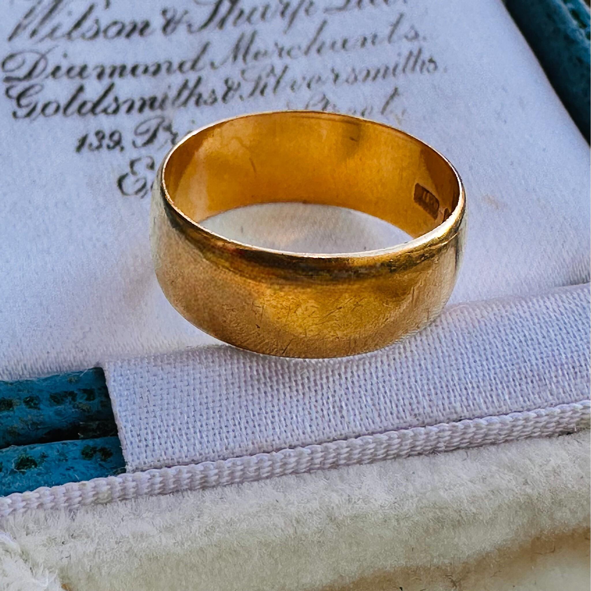 side view, vintage Solid 22ct Gold Wedding Ring, displayed in antique box