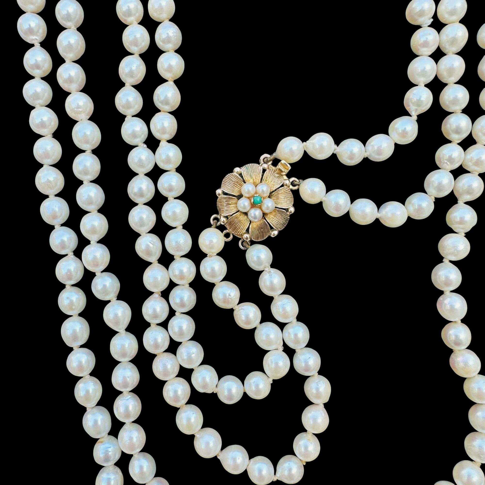 Cultured Pearl & Turquoise Necklace with black background.