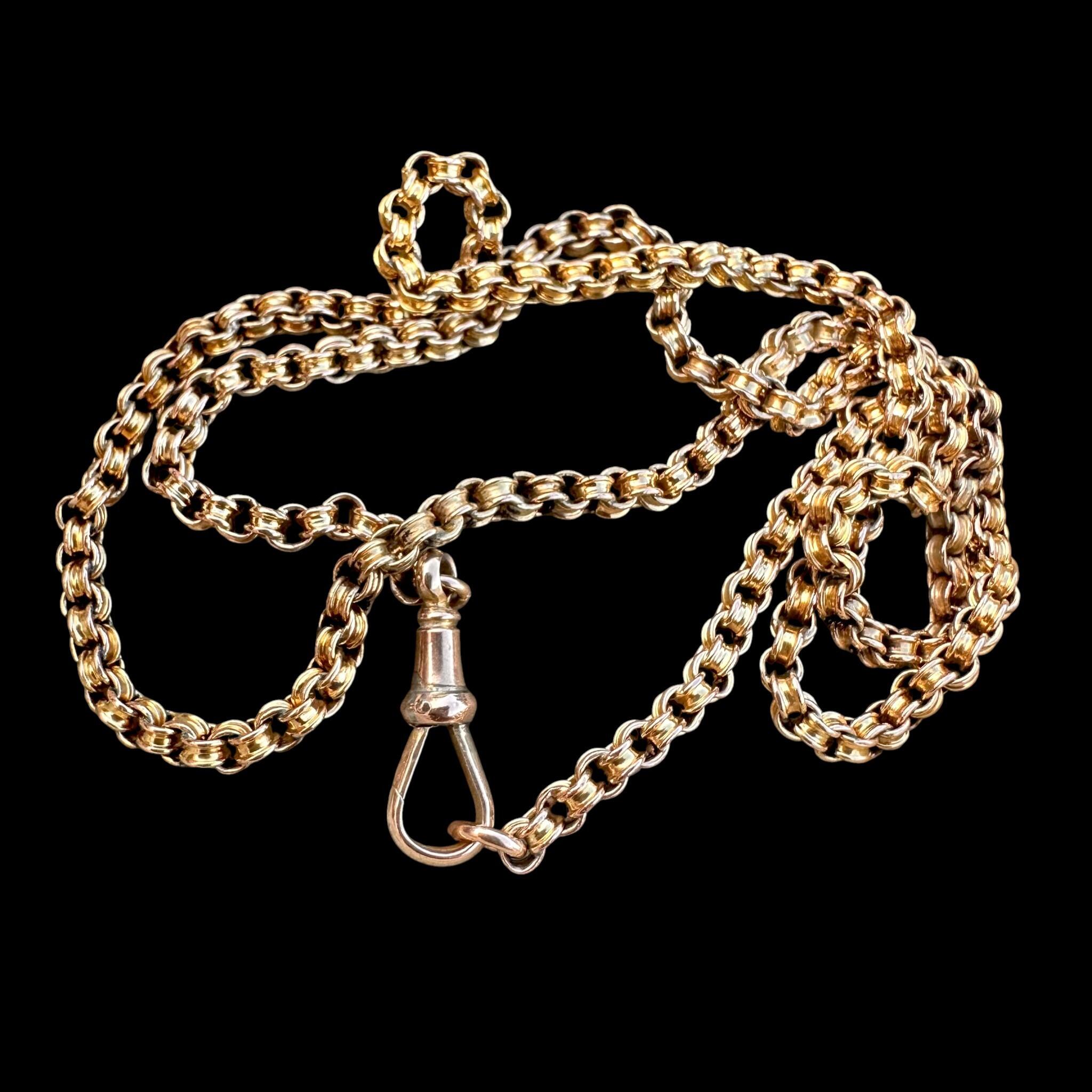 Gold Double Belcher Link Chain& Dog Clip Clasp, black background.
