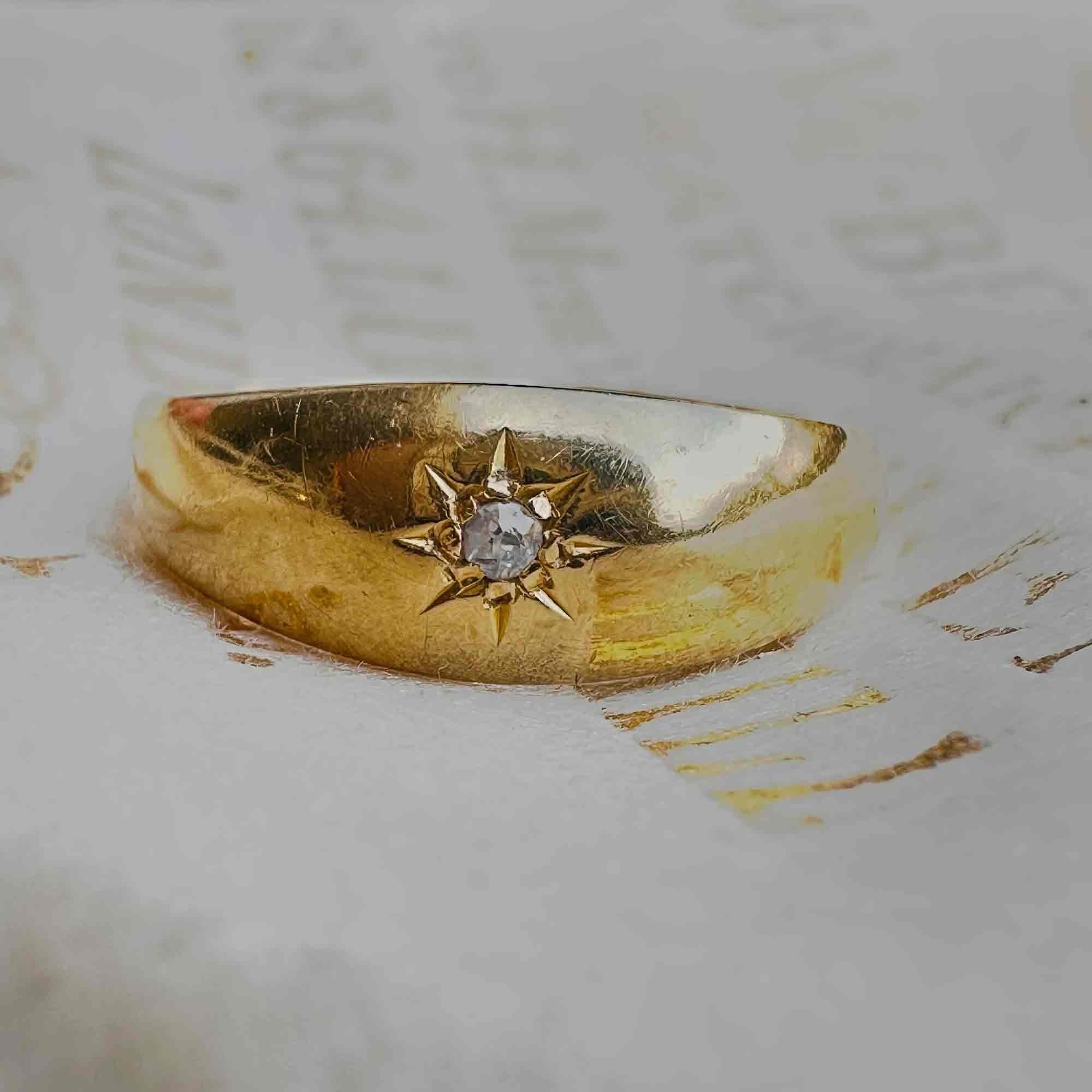 18ct Gold & Diamond Star Set Gypsy Ring, displayed on antique box