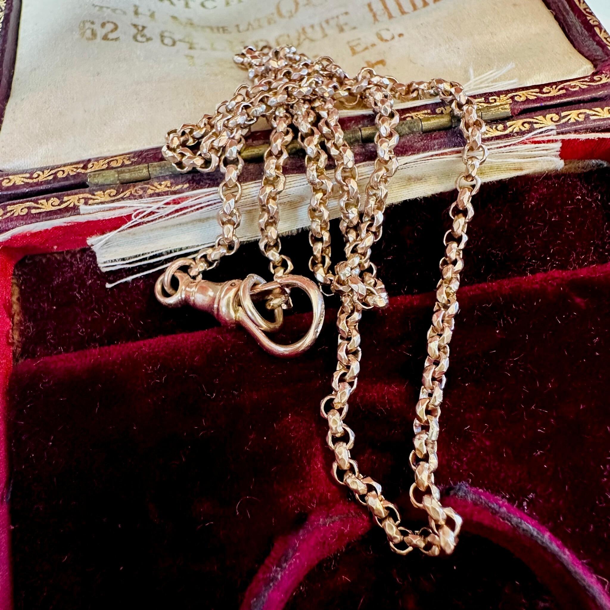 Rose Gold Belcher faceted Chain Necklace & Dog Clip displayed on antique box