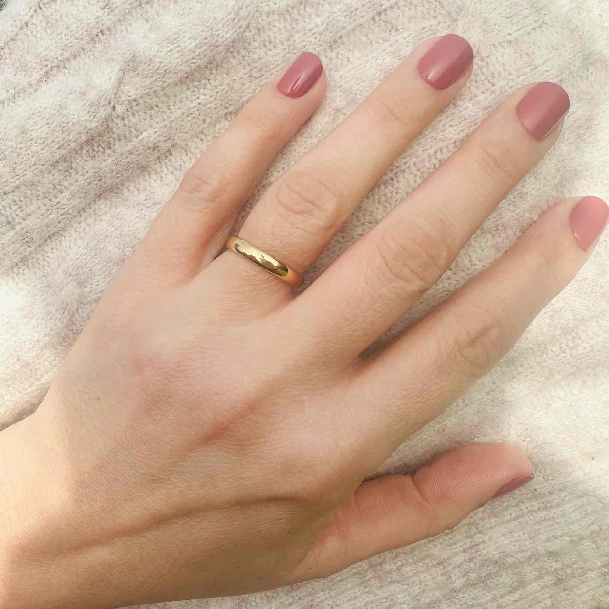 Art Deco 22ct Solid Yellow Gold D-Shaped Wedding Ring displayed on models hand