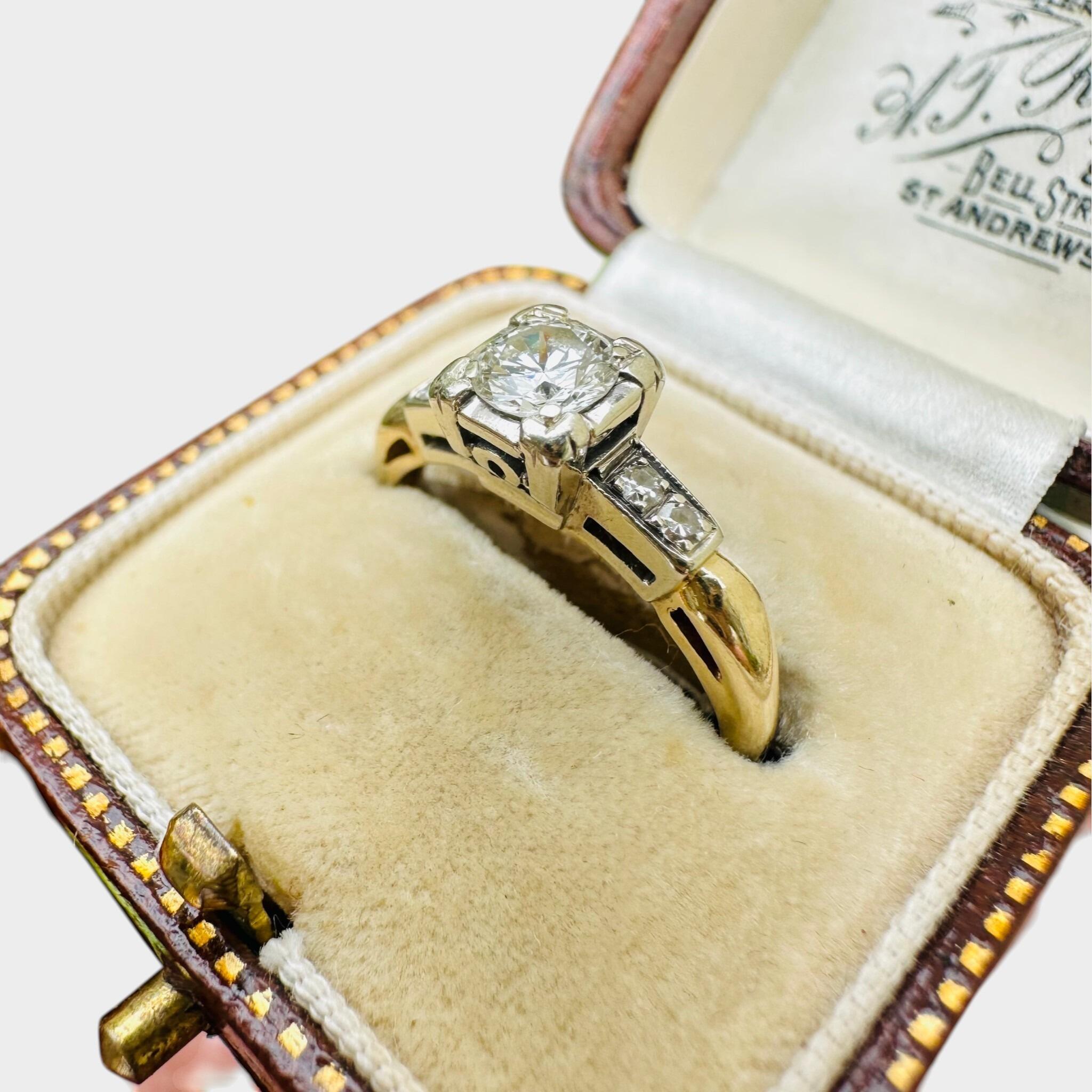 side view of 18ct Gold & Platinum Diamond Solitaire 0.55ct Ring displayed in antique box