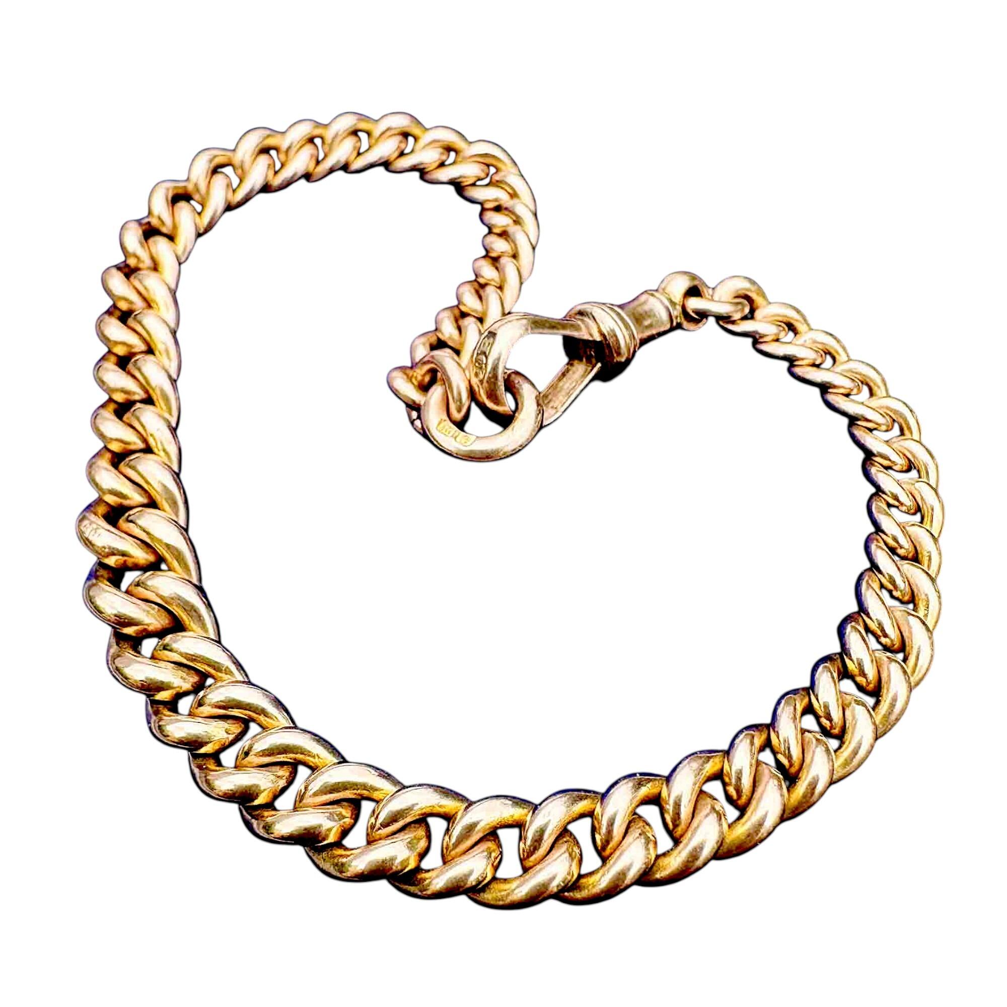 Edwardian 9ct gold curb link bracelet with traditional dog clip clasp with white background