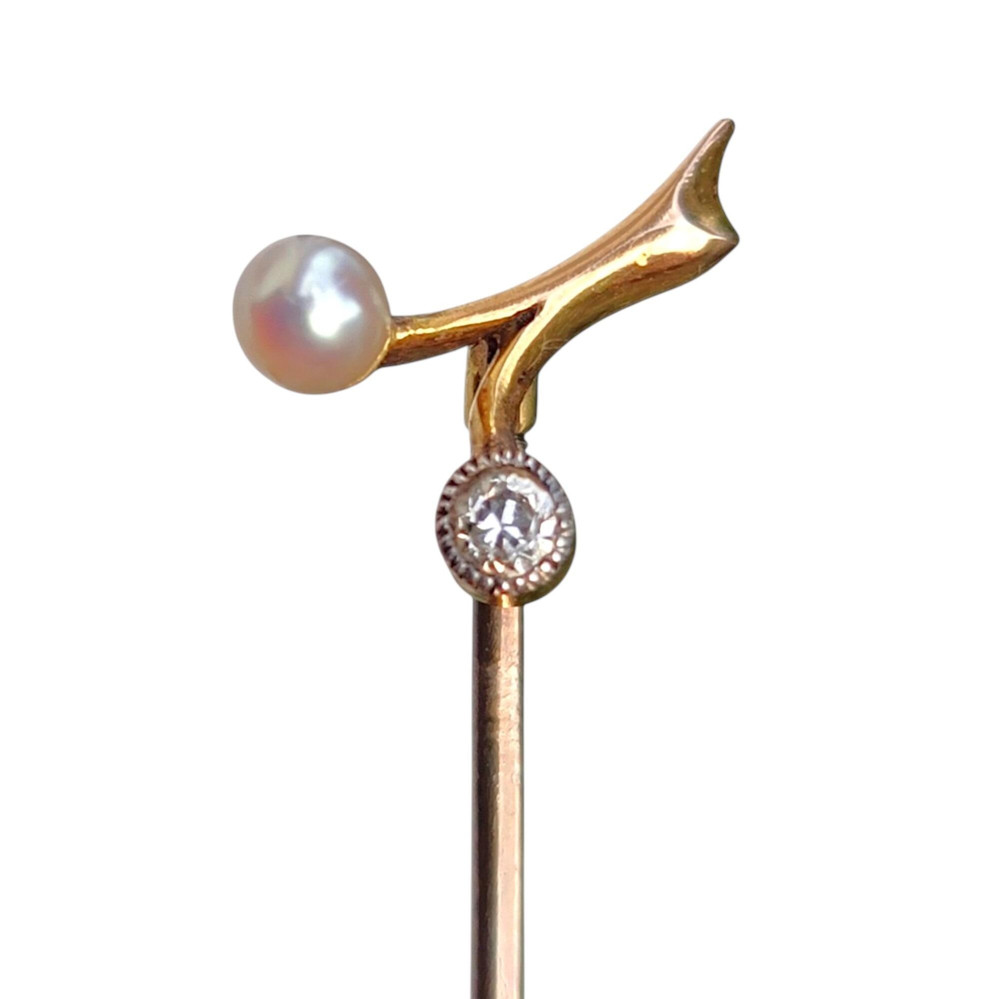 Antique Edwardian 15ct yellow gold stick pin featuring a pair of berries on a stem, one represented by a pearl, the other a diamond