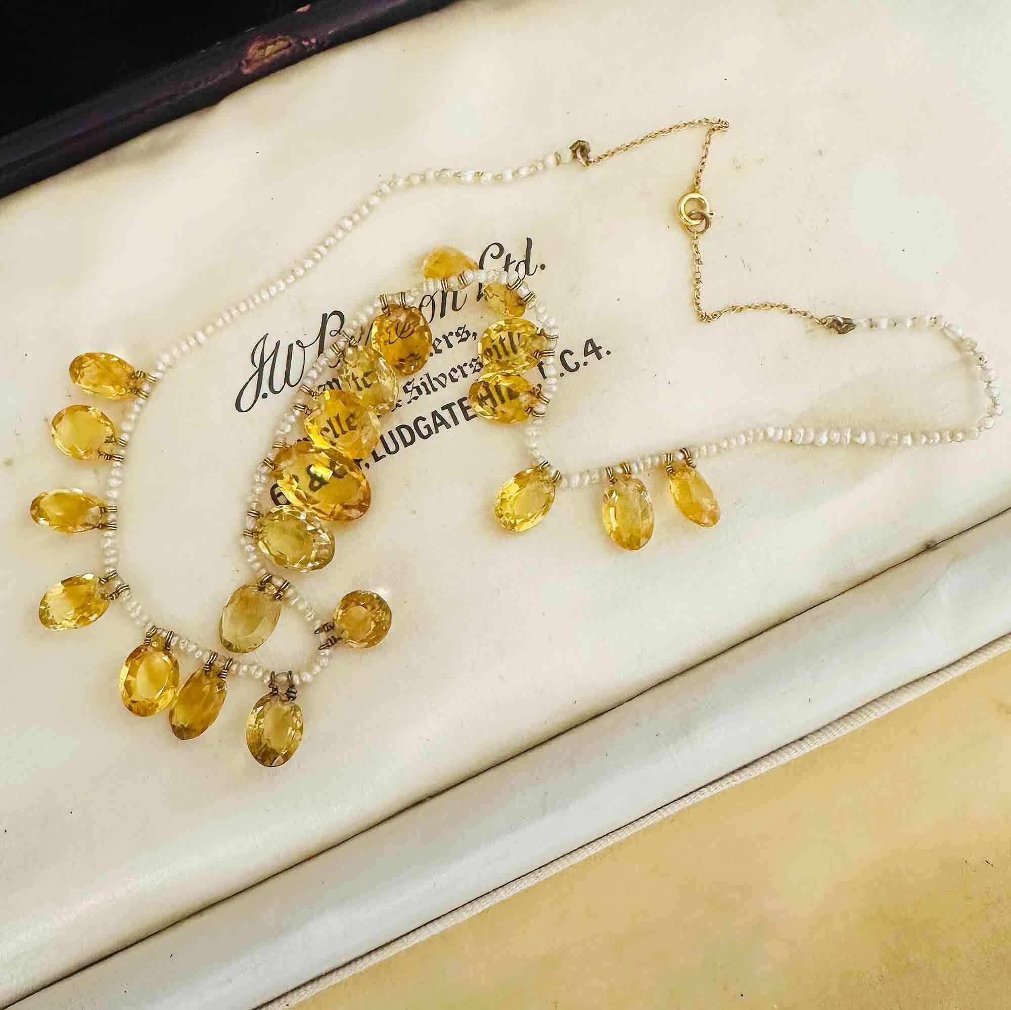 Full view of Edwardian citrine and pearl fringe necklace with 9ct gold chain, circa 1901.