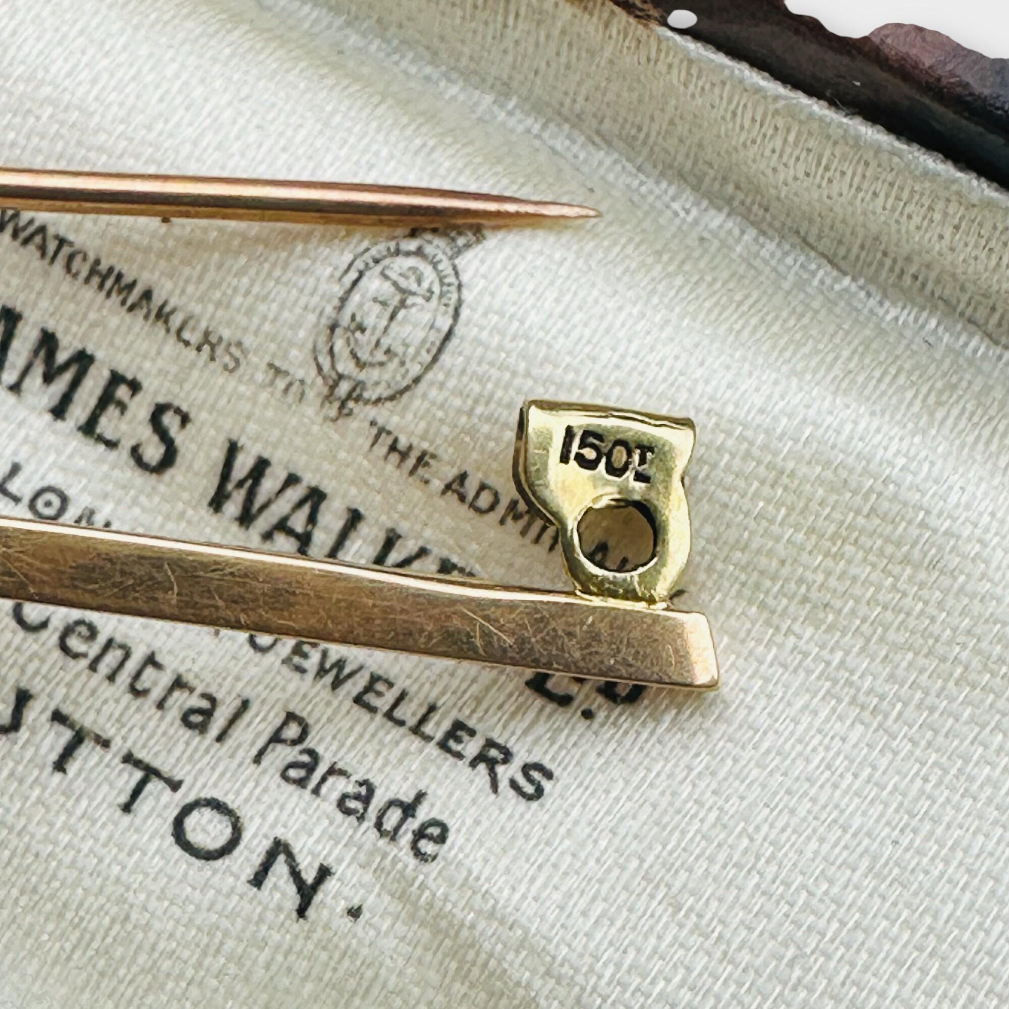 Hallmark of elegant Edwardian aquamarine bar brooch features a stunning 7x5mm oval aquamarine, mounted securely in a classic collet setting in antique box.