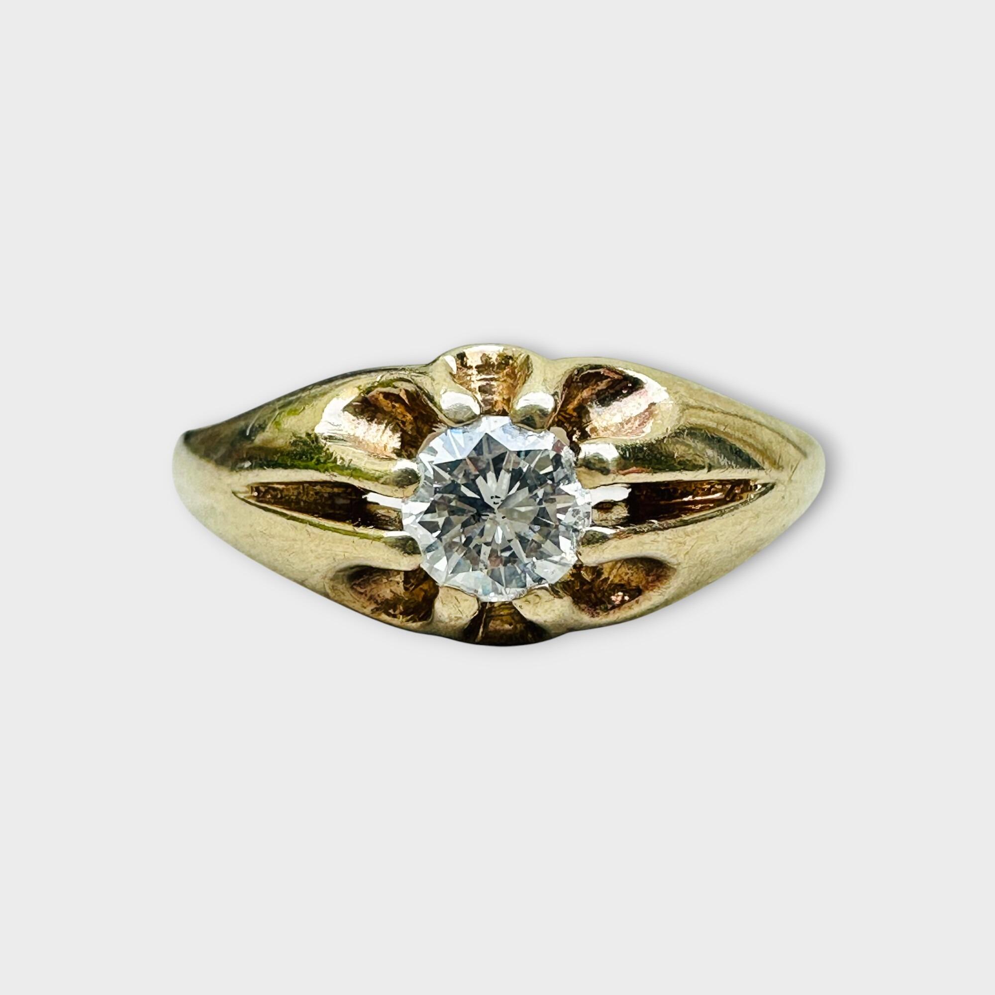 gents gold diamond solitaire gypsy ring on grey background