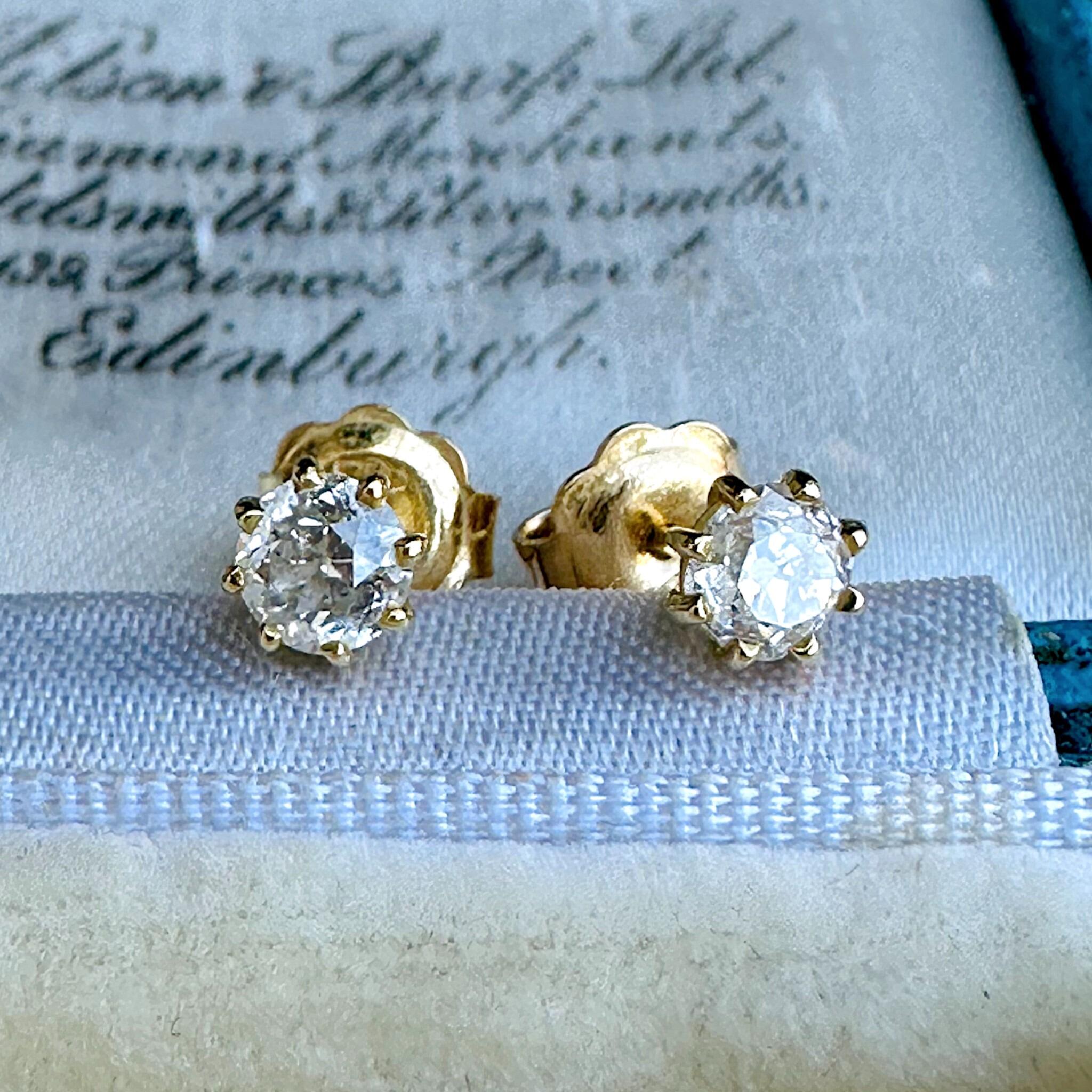 Old European Cut Diamond Earrings: 18k Gold Solitaire Studs (0.80ct) displayed on antique box