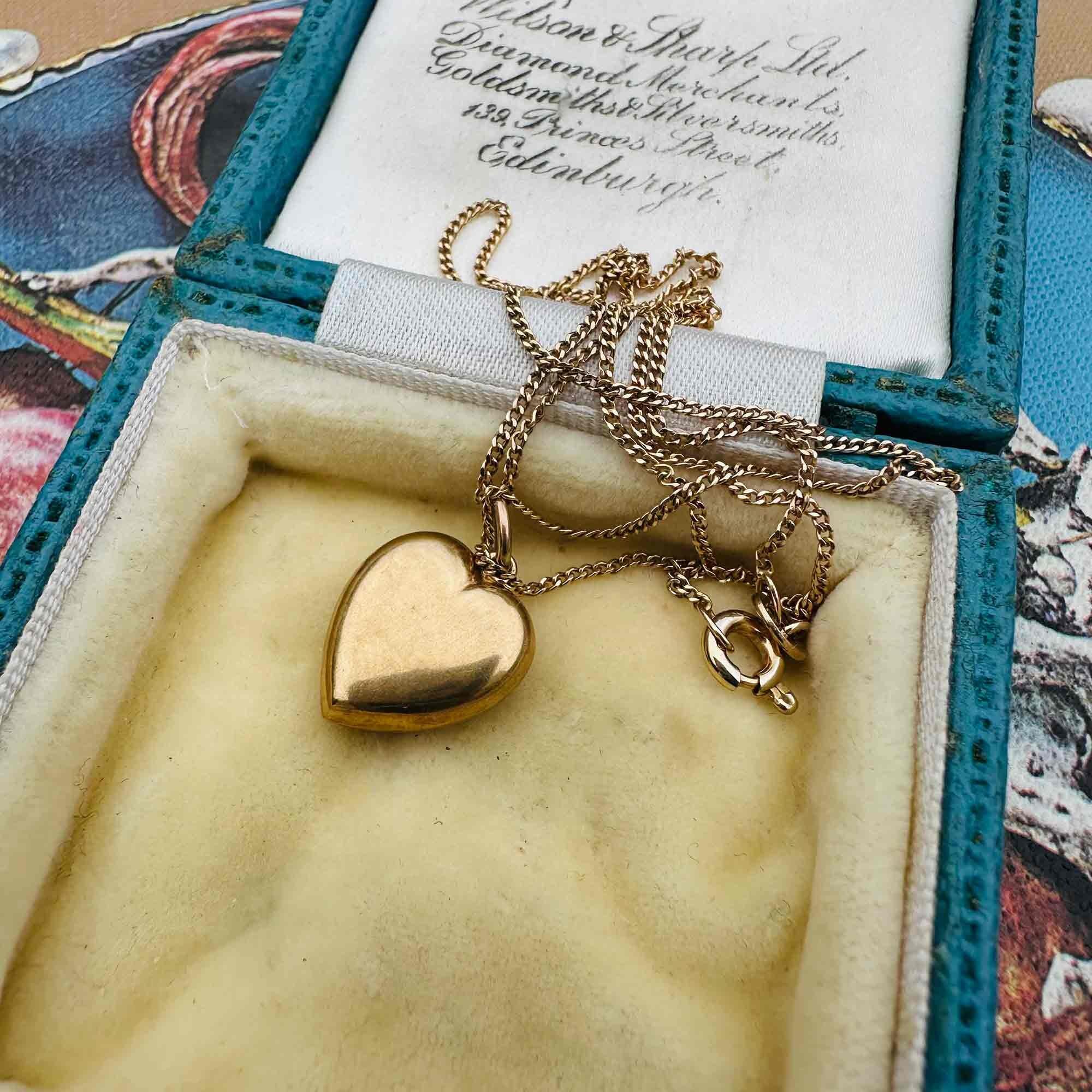 Gold Puffy Heart Necklace with Chain Dating 1942, displayed in antique box