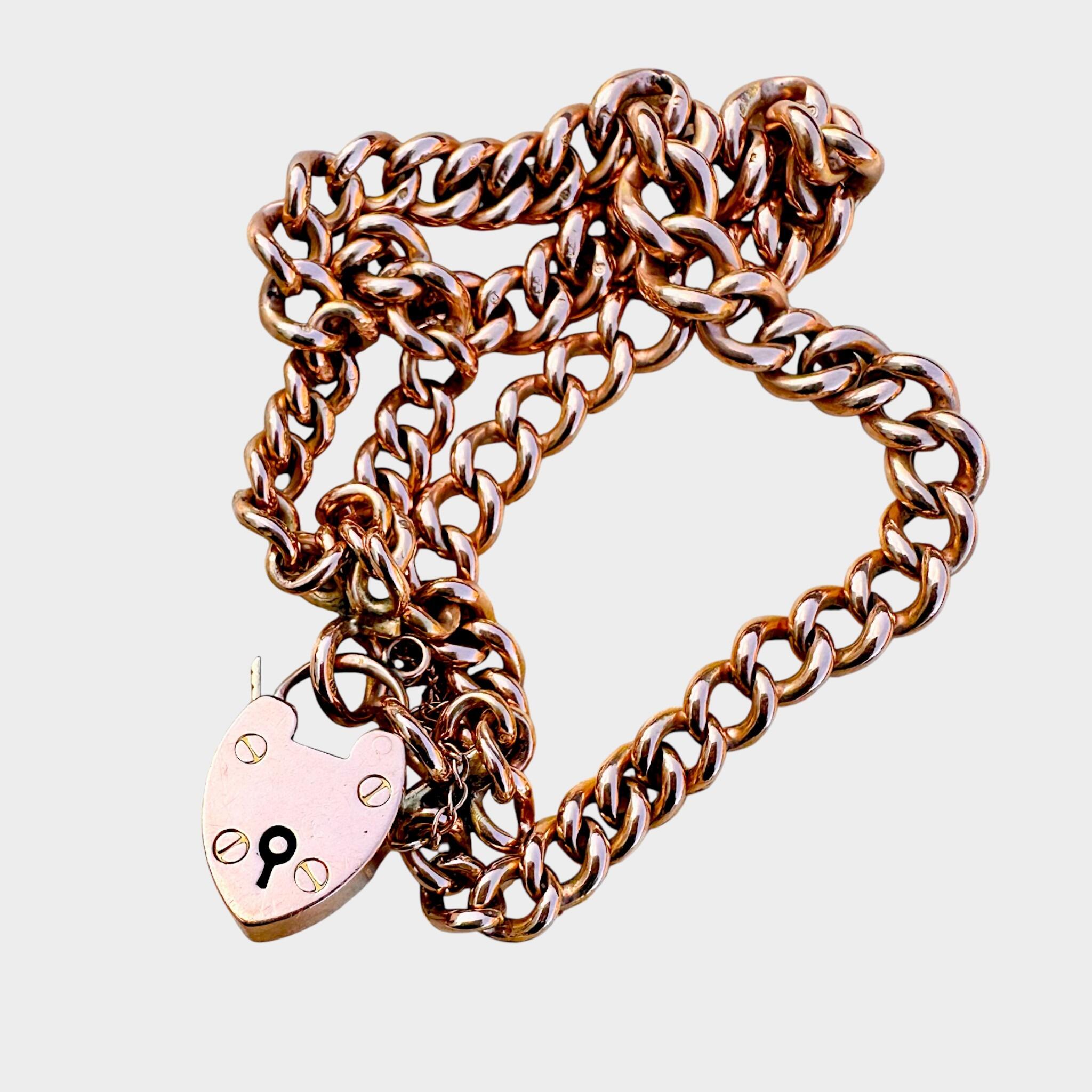 Rose Gold Double Curb Link Bracelet with Heart Padlock, grey back ground.