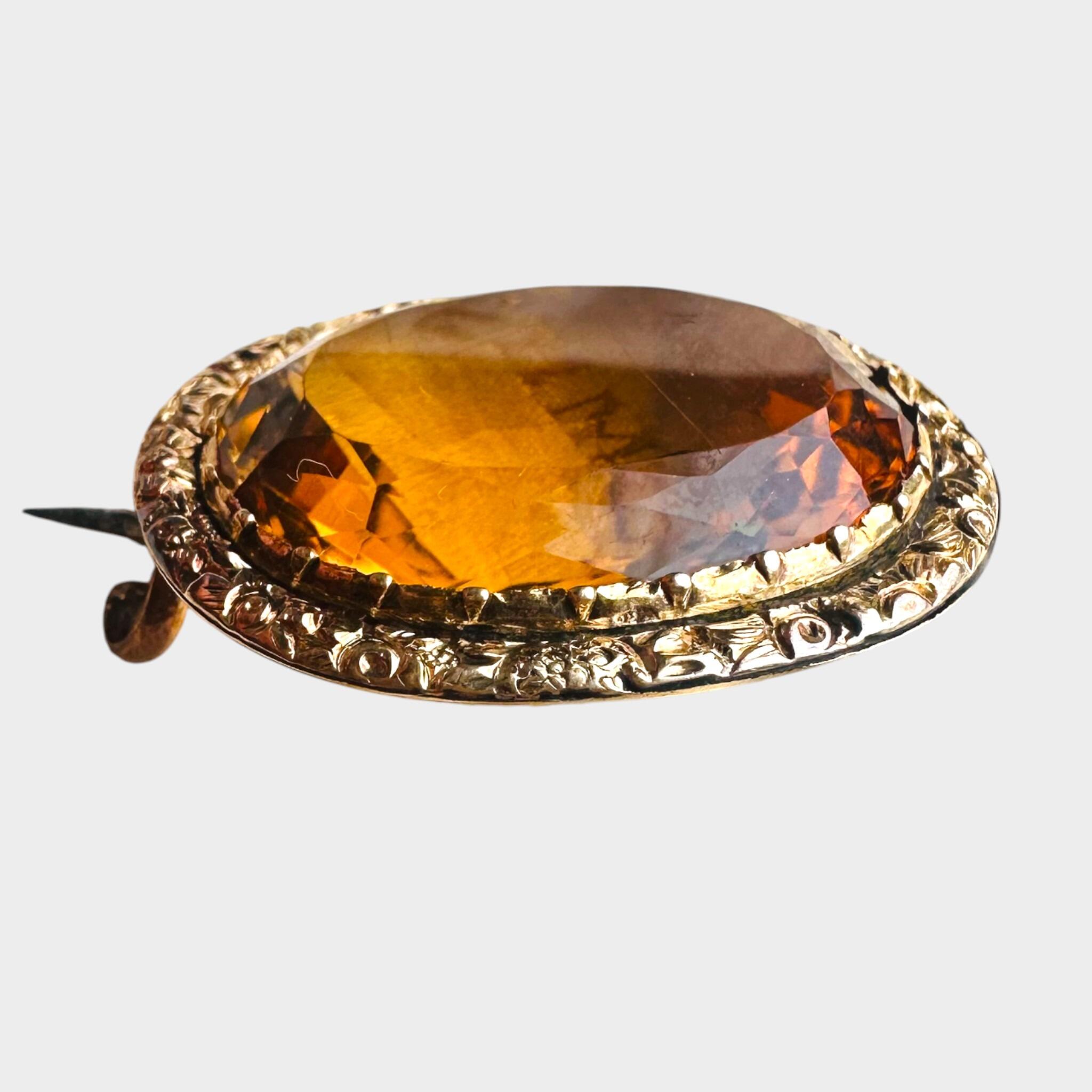 15k Gold large Citrine Brooch, grey background.