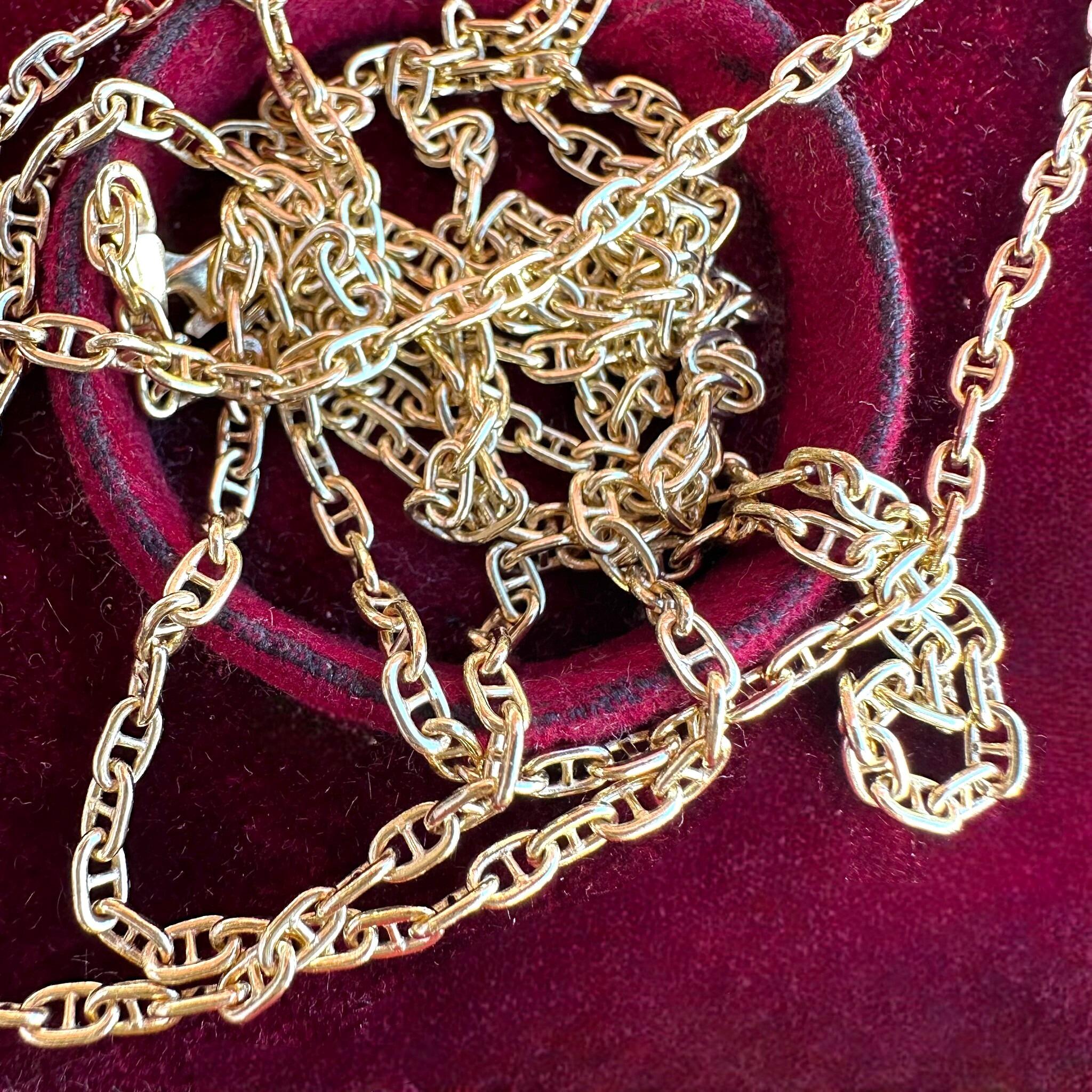 Gold Mariner Anchor Link Chain Necklace displayed laying in red velvet antique box