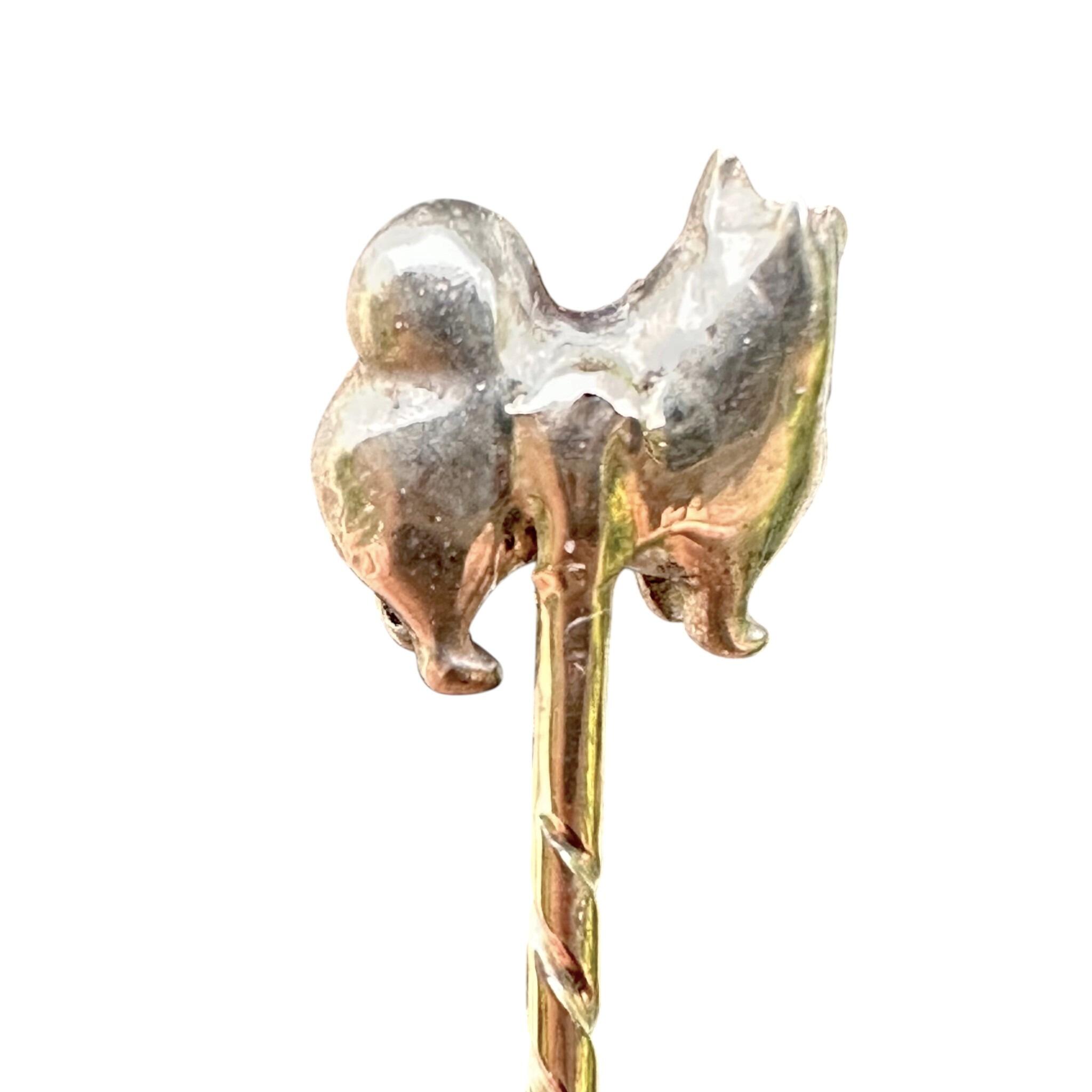 19th-century stick pin with Pomeranian dog motif and rose cut diamonds.