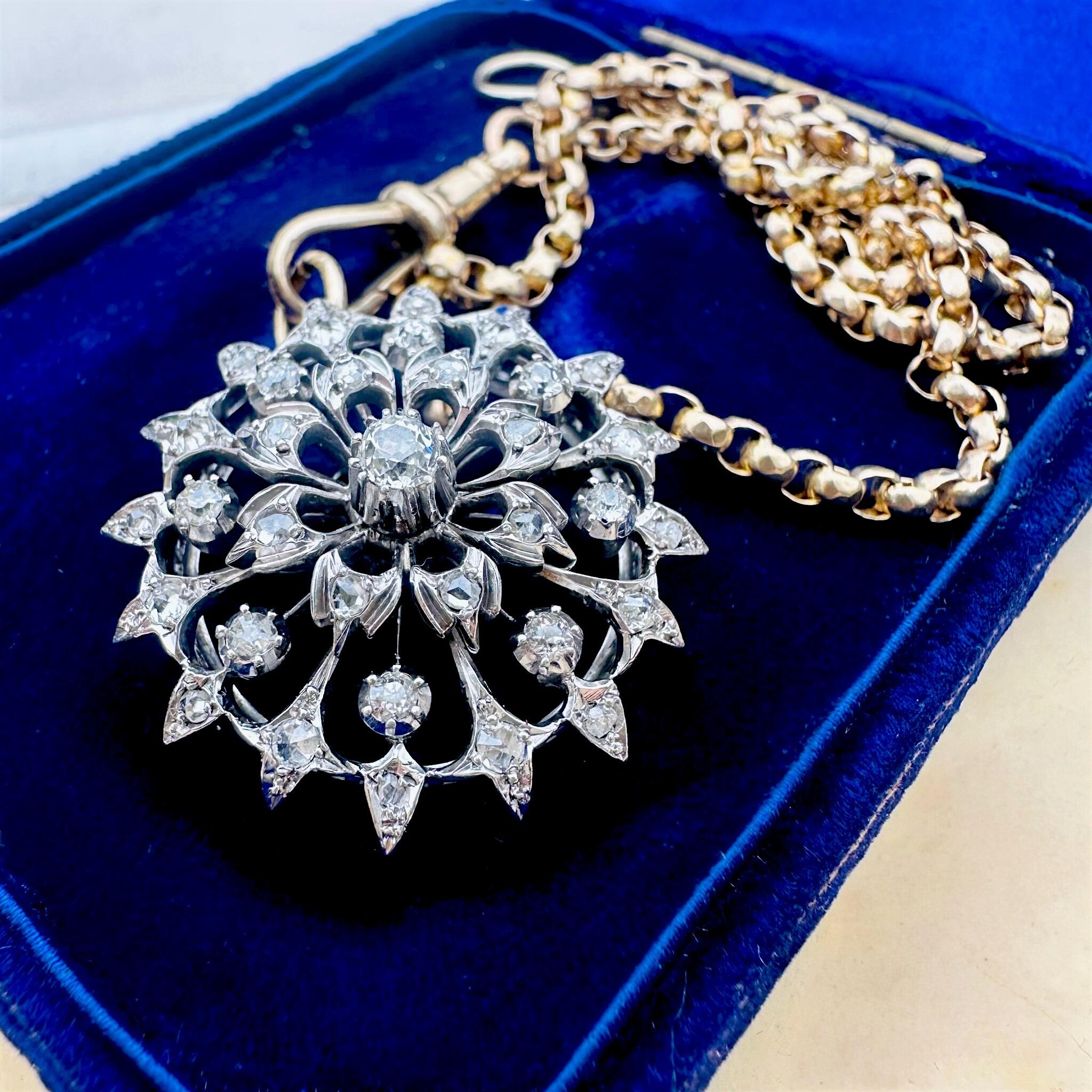 Antique Victorian Diamond Flower Pendant Brooch, displayed on blue velvet box