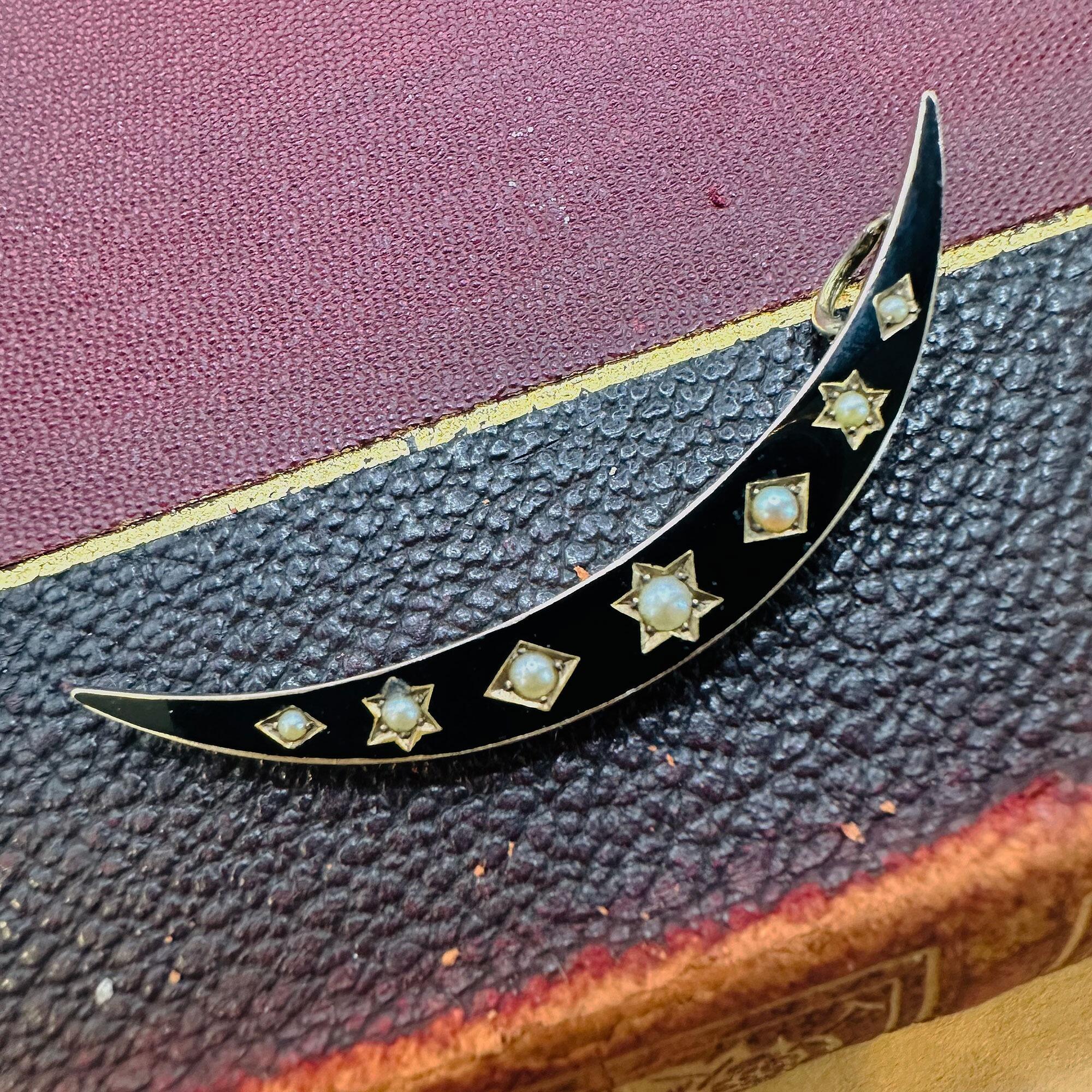 Victorian 15k Rose Gold Black Enamel & Pearl Crescent Moon Pendant on antique book
