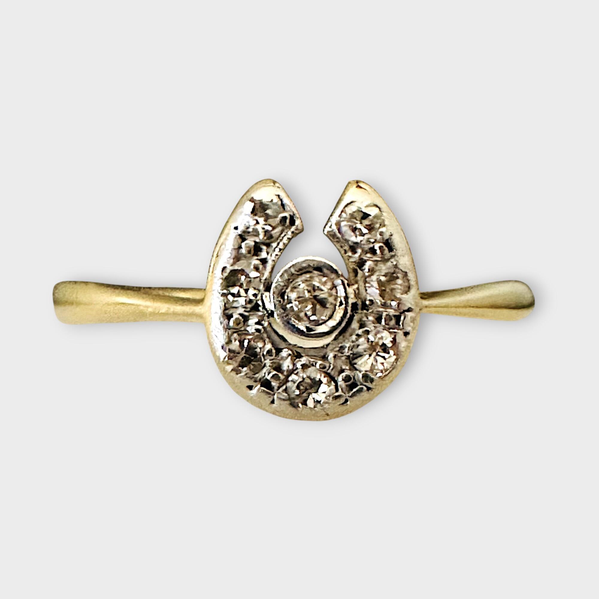 18k Gold & Platinum Diamond Horseshoe Ring, Front view with grey background.